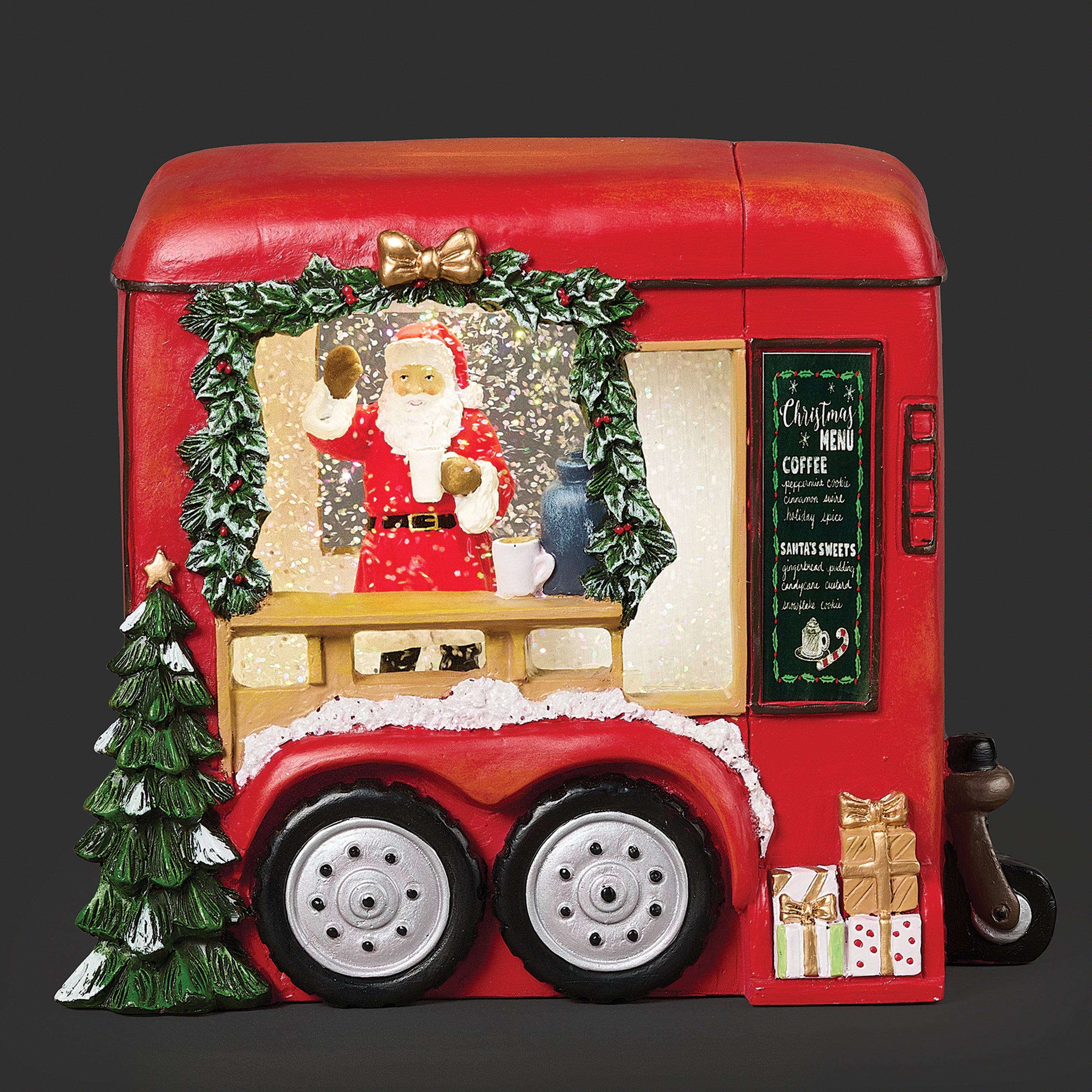Decorative Christmas truck with Santa inside, surrounded by festive elements on a dark background.