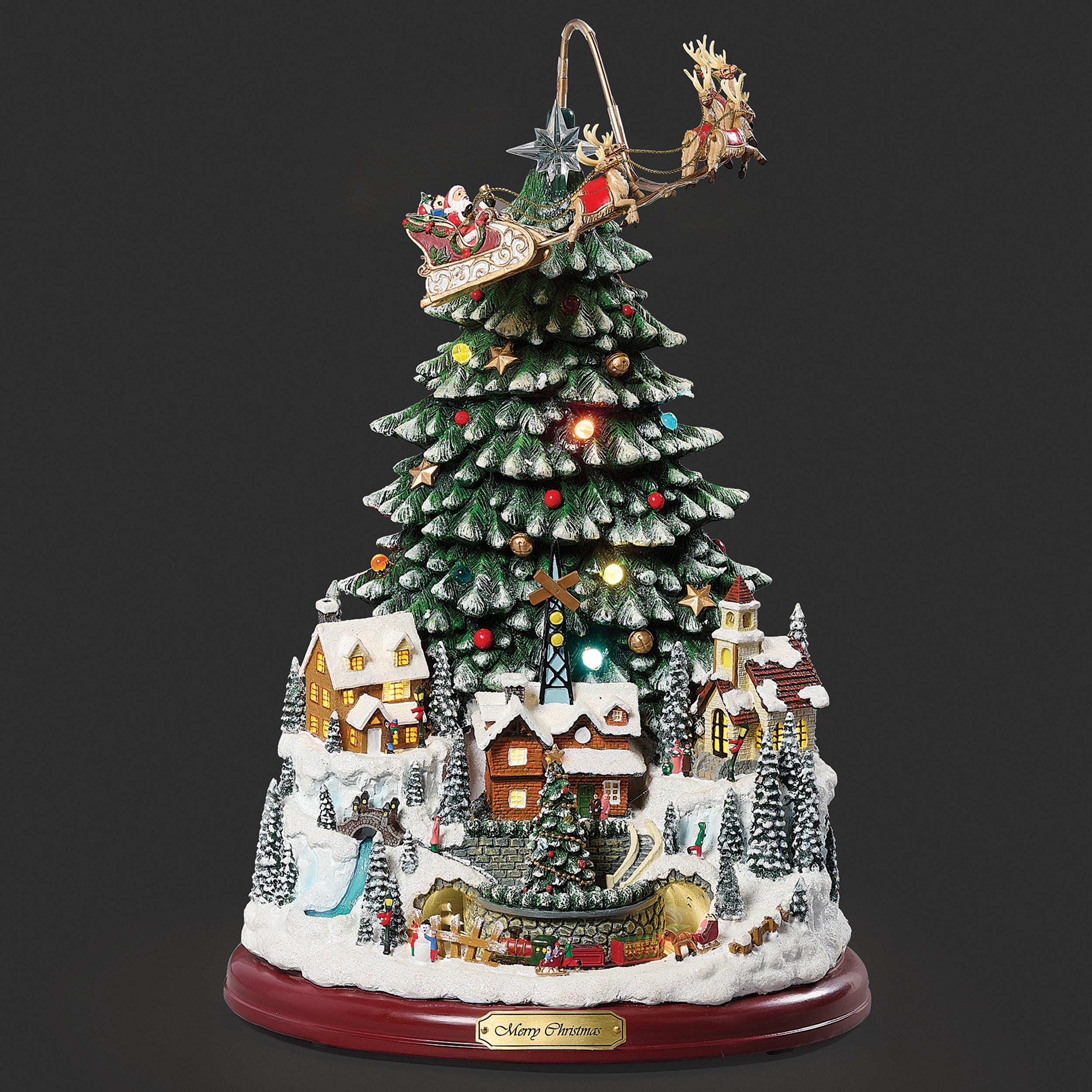 Lighted Musical Christmas Tree with Village & Rotating Train - Amusements