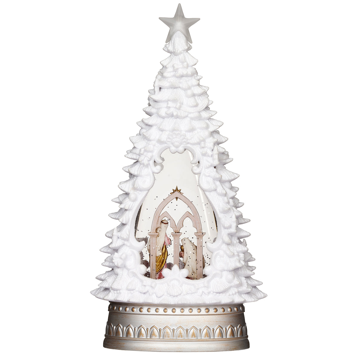 White Christmas tree with a Nativity scene nestled among sculpted branches above an ornate metallic base.