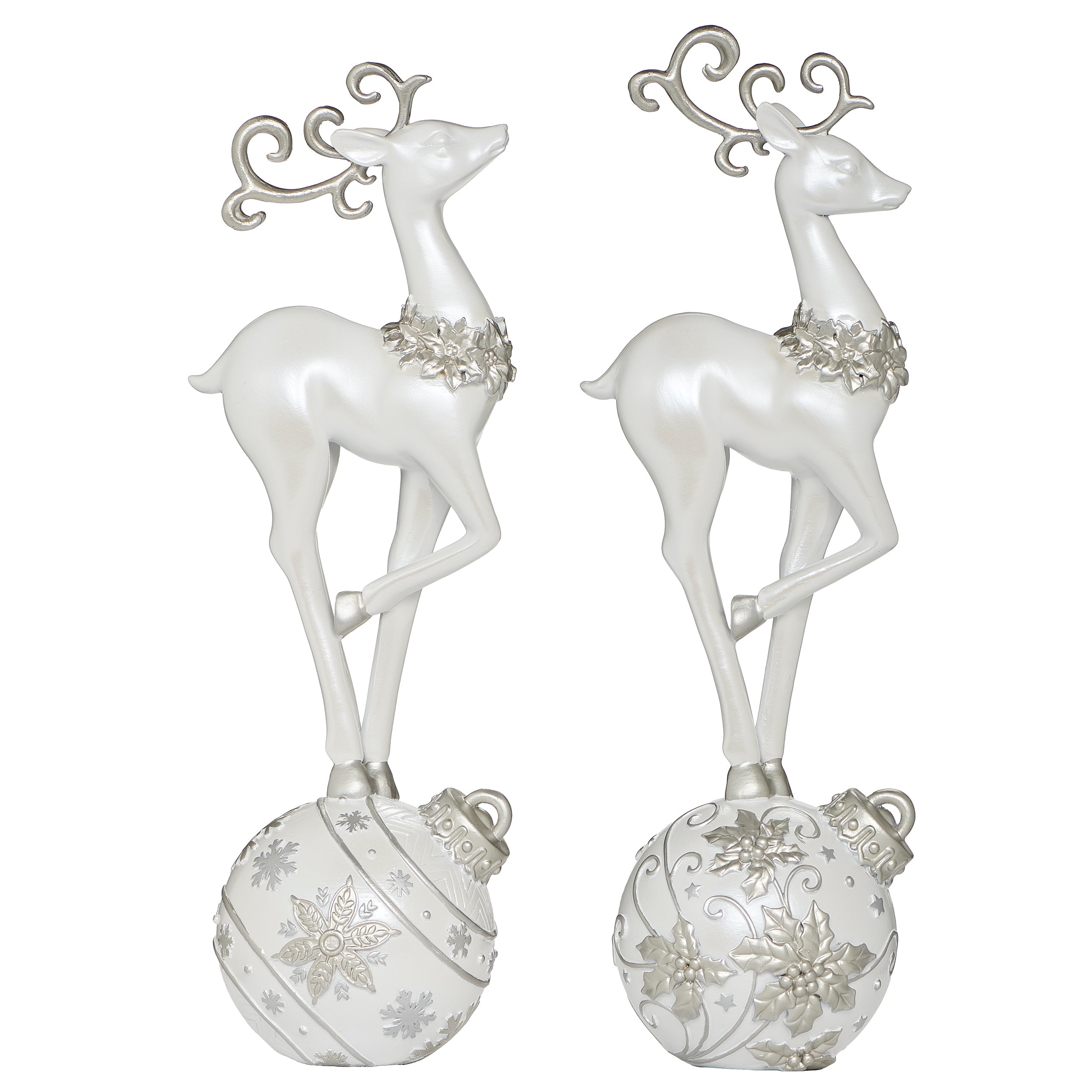 Pair of white deer figurines with decorative silver elements