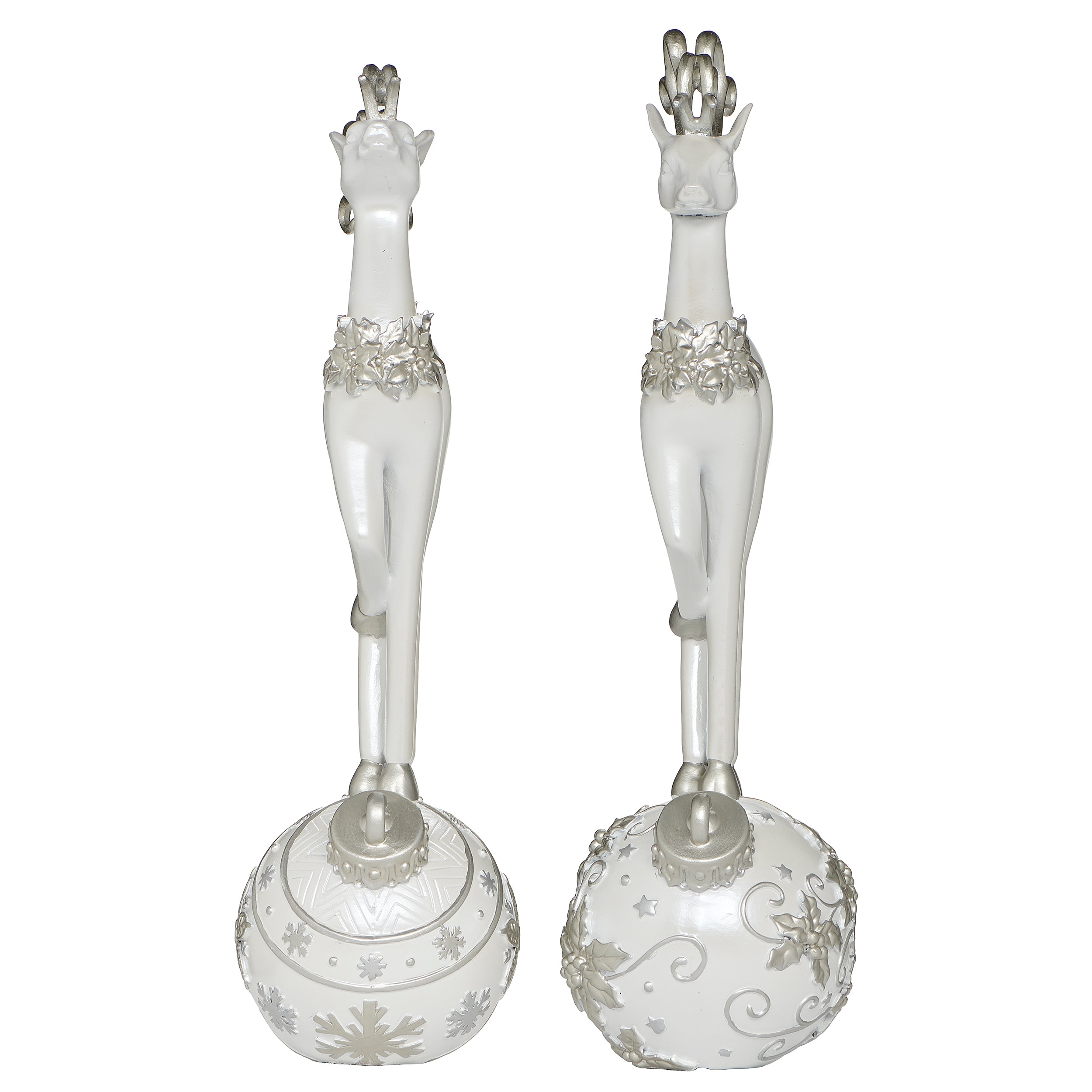 Pair of white deer figurines with decorative silver elements