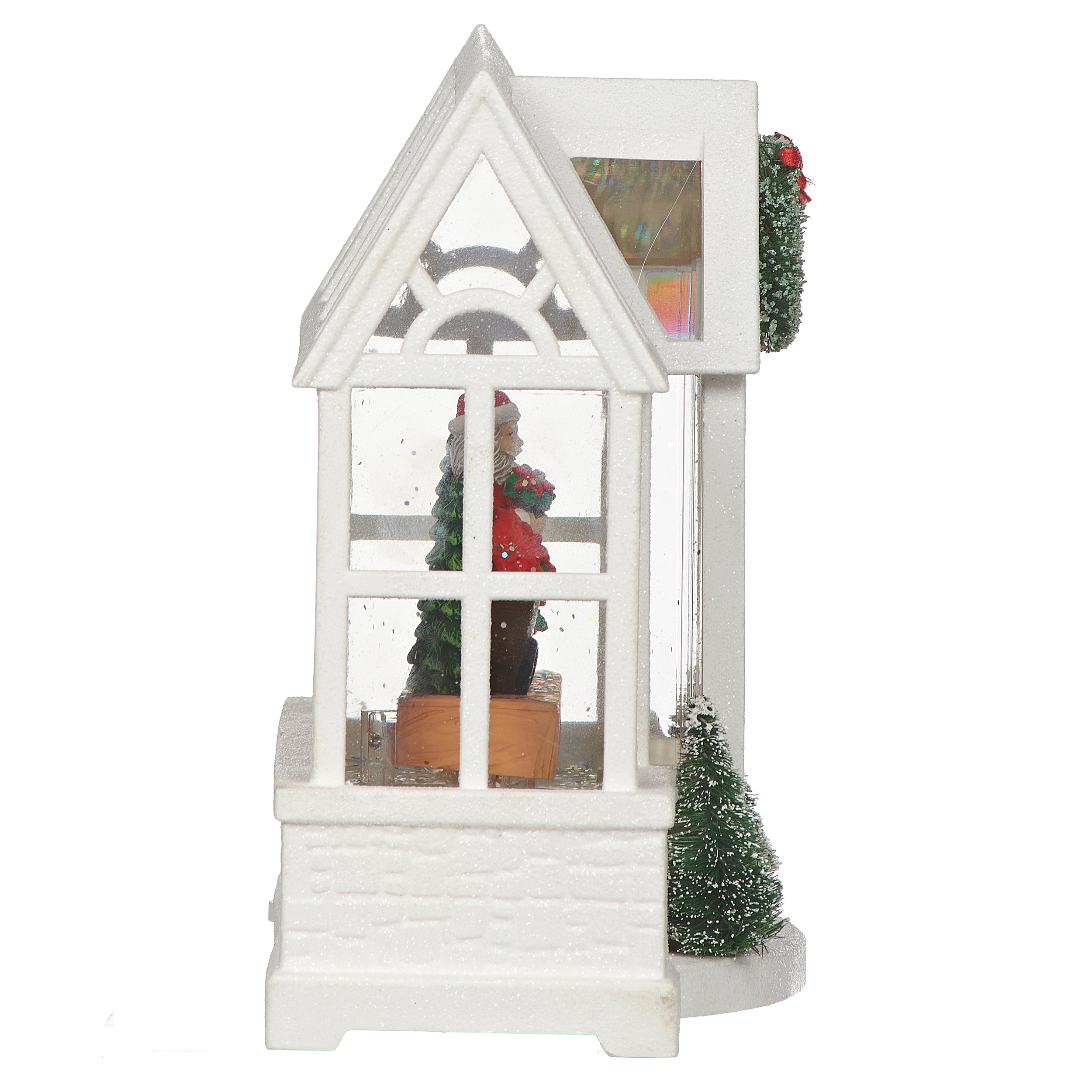 Decorative white house-shaped lantern with Christmas decorations on a white background