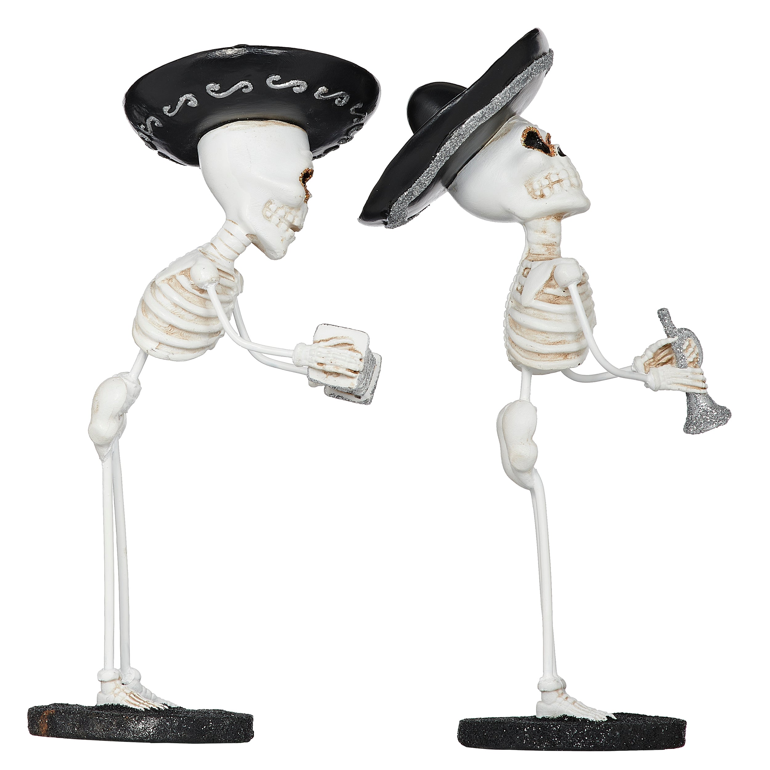 Two skeleton figures wearing sombreros 
