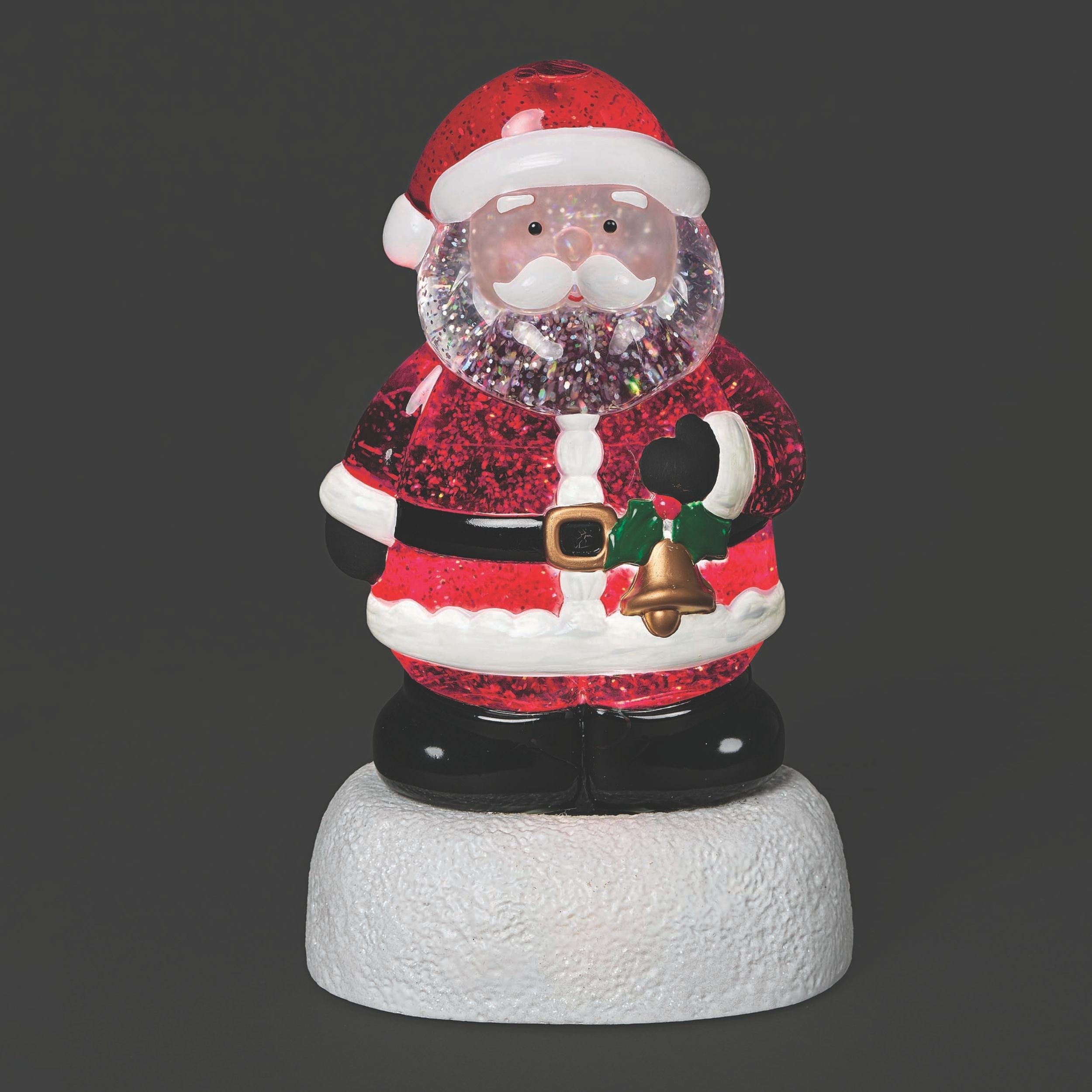 Santa Claus on a snow-like podium with sparkling glitter inside on black background