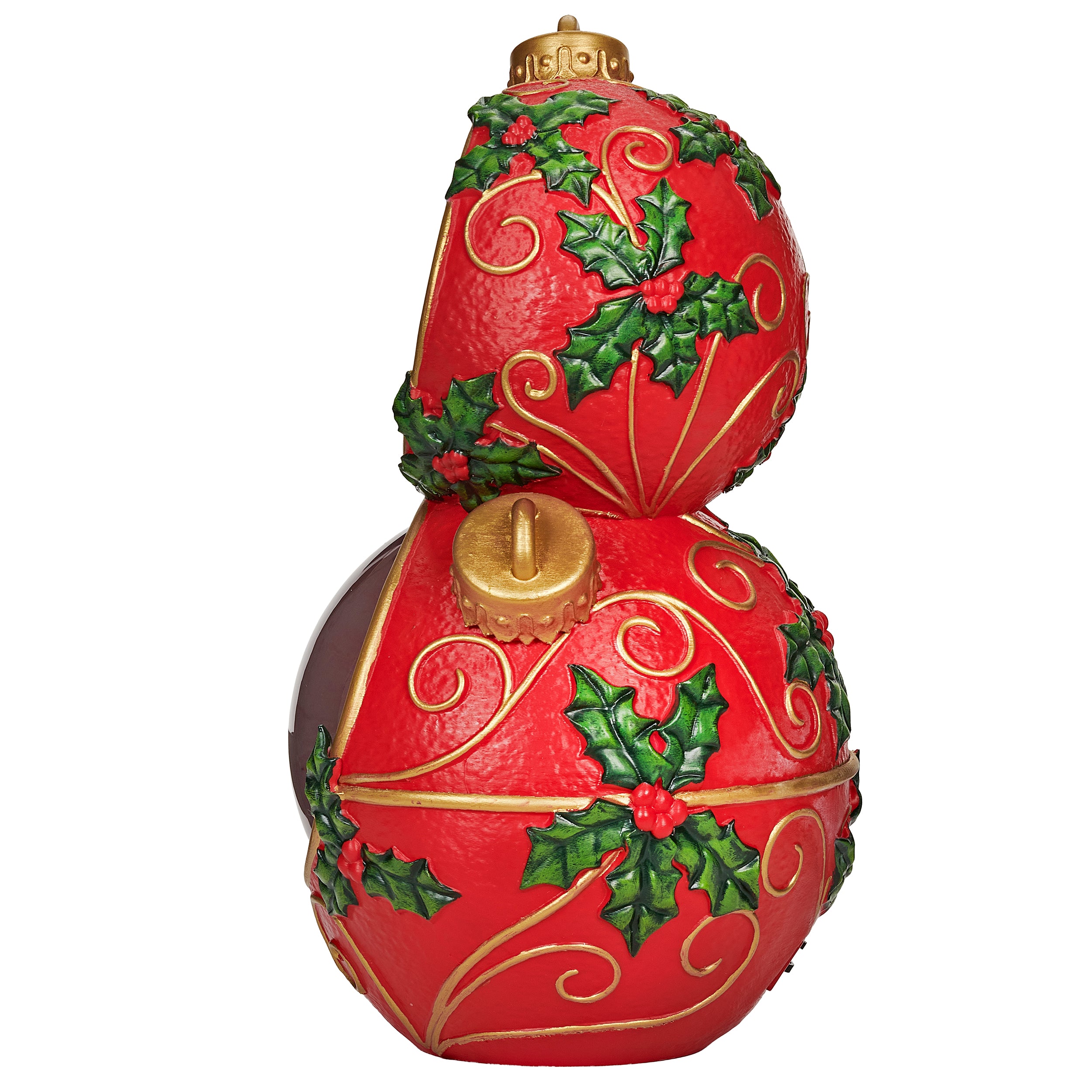 Decorative red Christmas ornament with gold accents and holly leaves on a white background