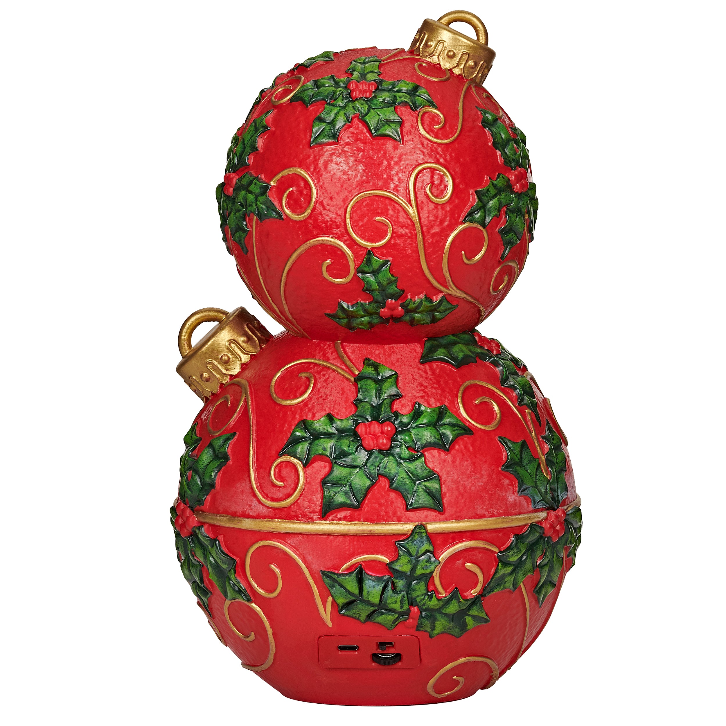 Decorative red ornament with green holly leaves and gold accents on a white background