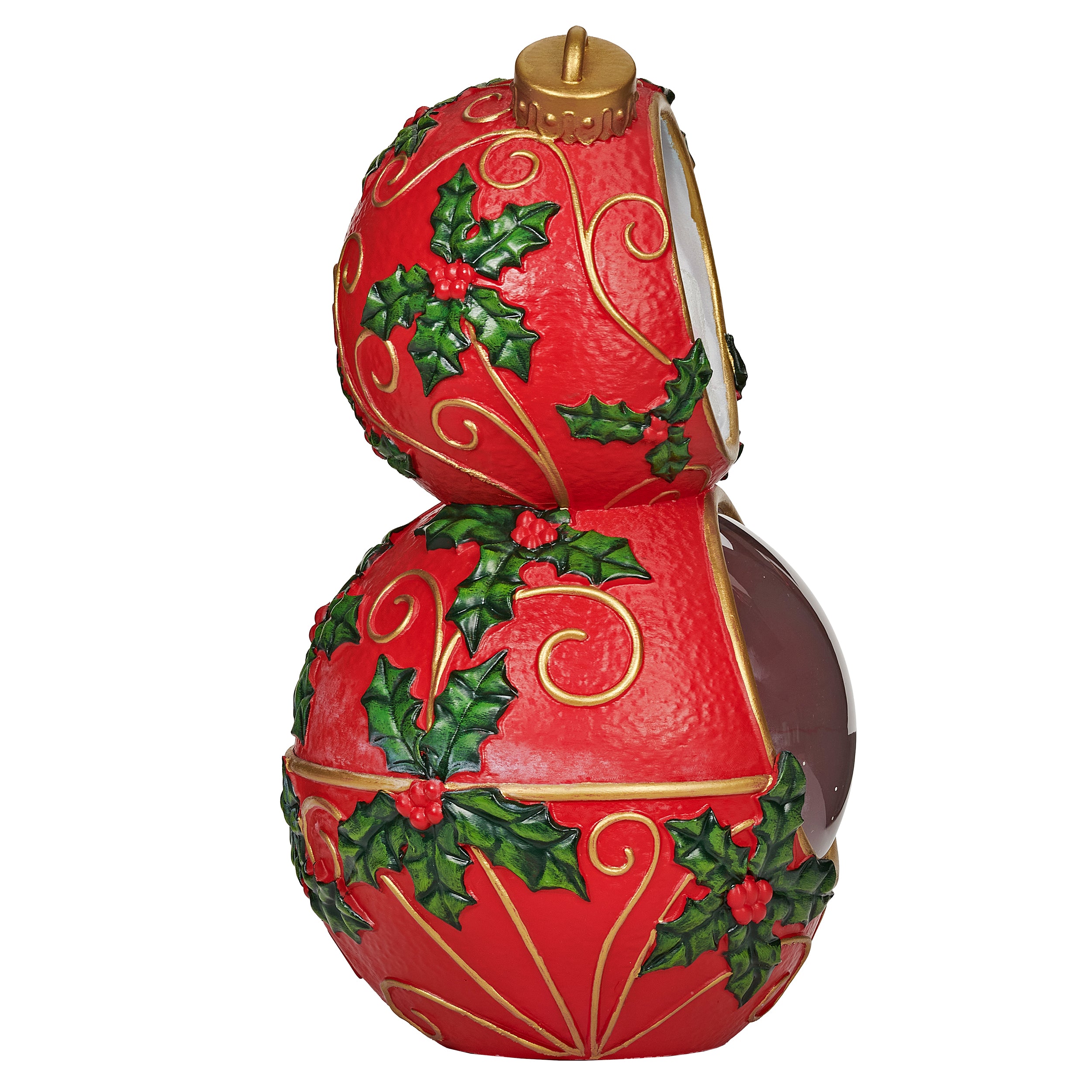 Decorative red ornament with holly leaves and gold accents on a white background