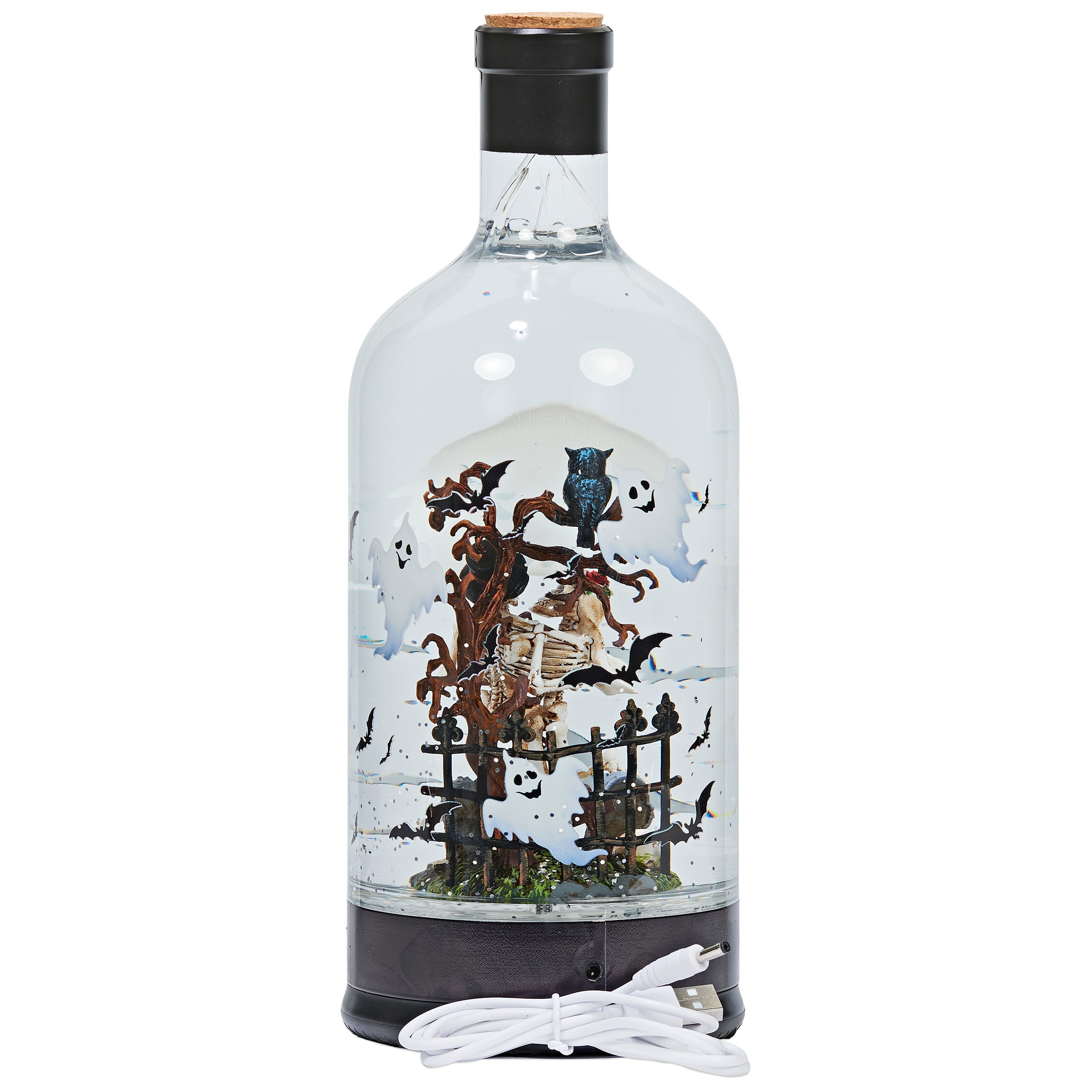 Decorative bottle with skeleton and ghost figures inside