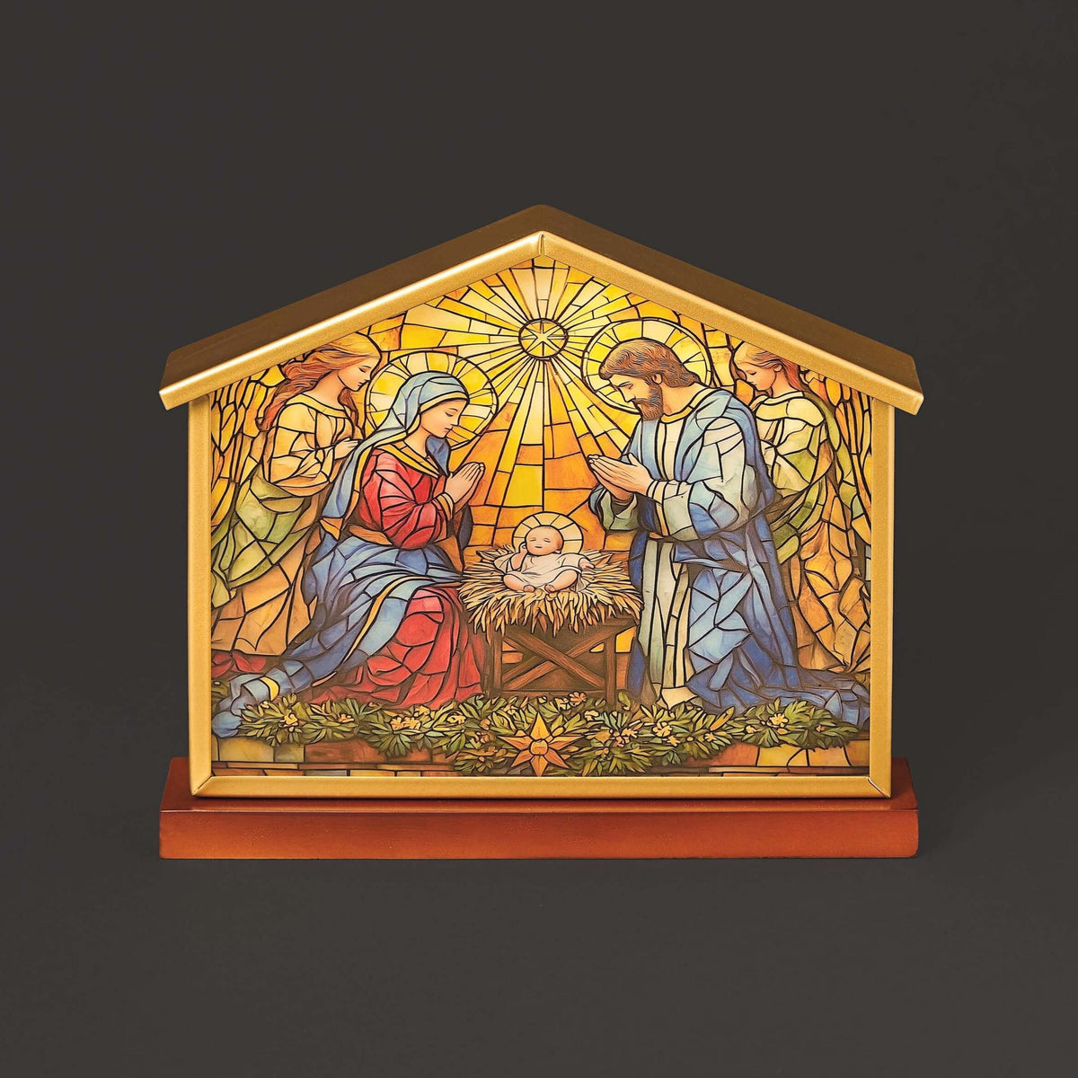 Stained glass lighted nativity scene in a stable on a dark background