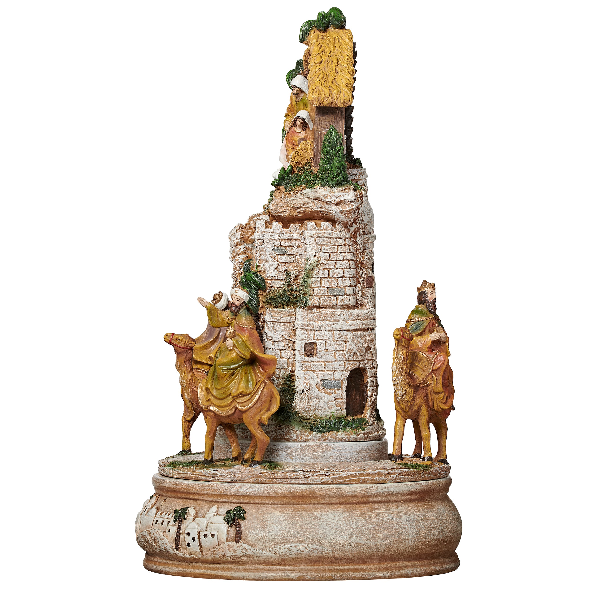 Decorative nativity scene figurine with stable and figures on a white background
