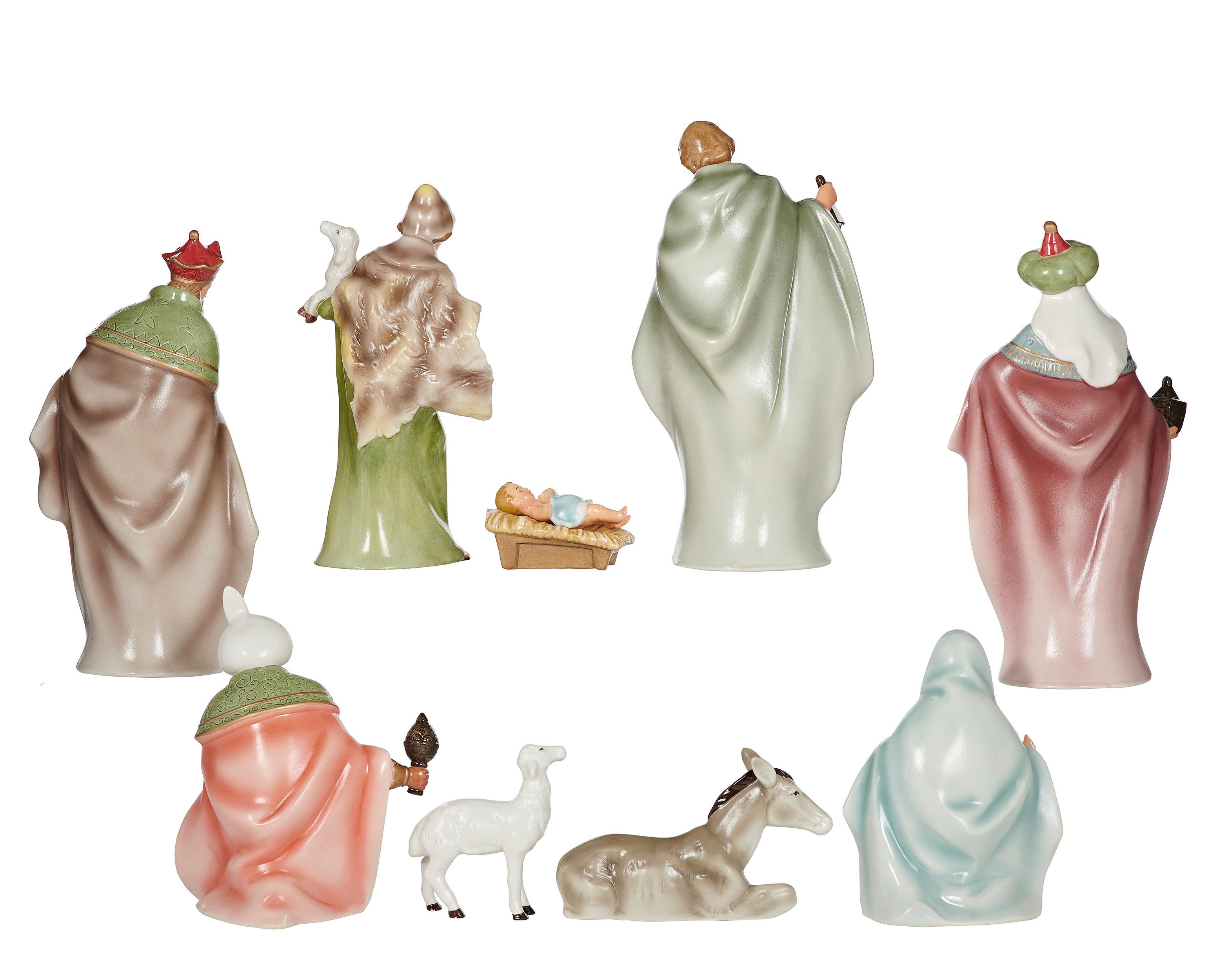 Nativity scene figurines set on a white background