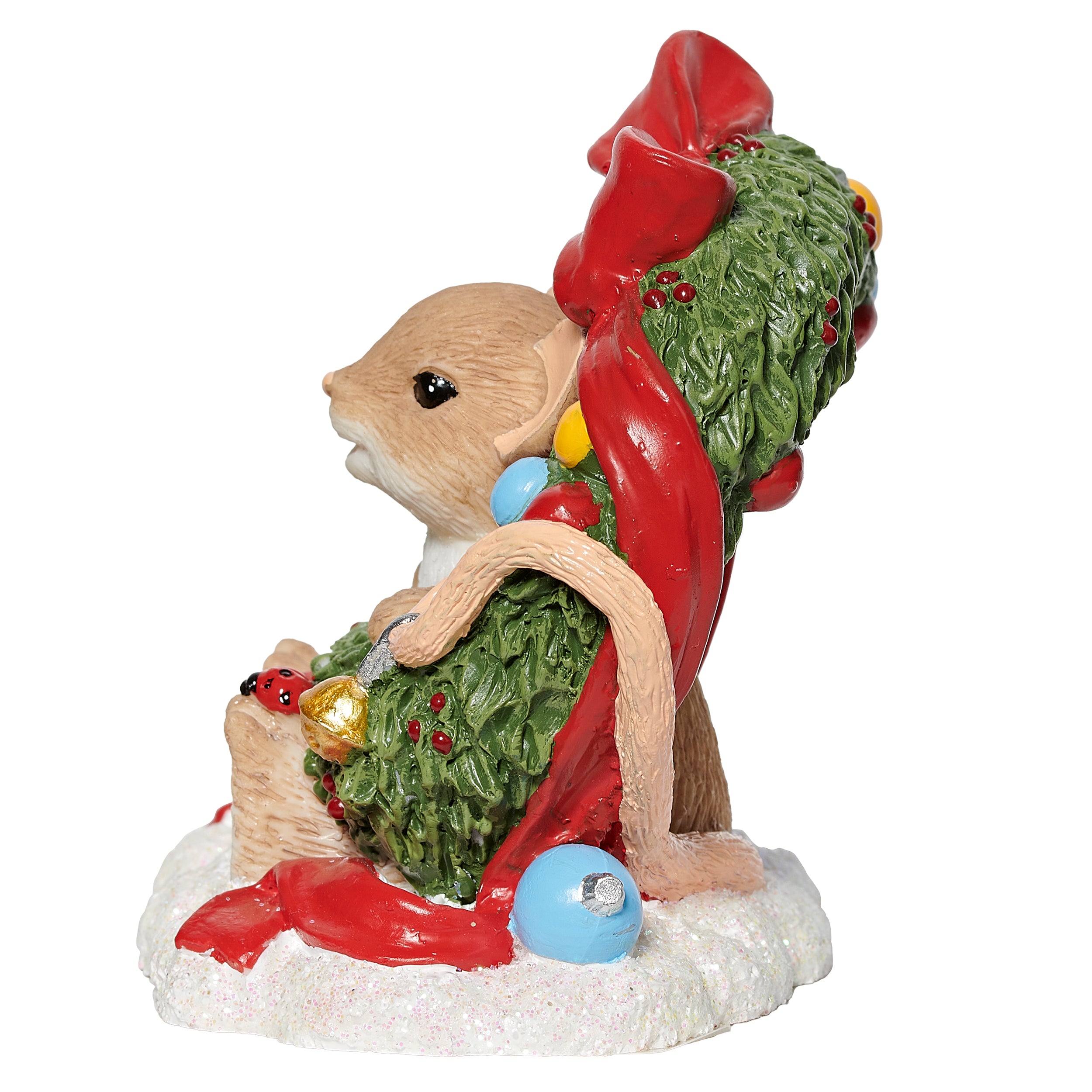 Decorative figurine of a mouse in a Christmas wreath