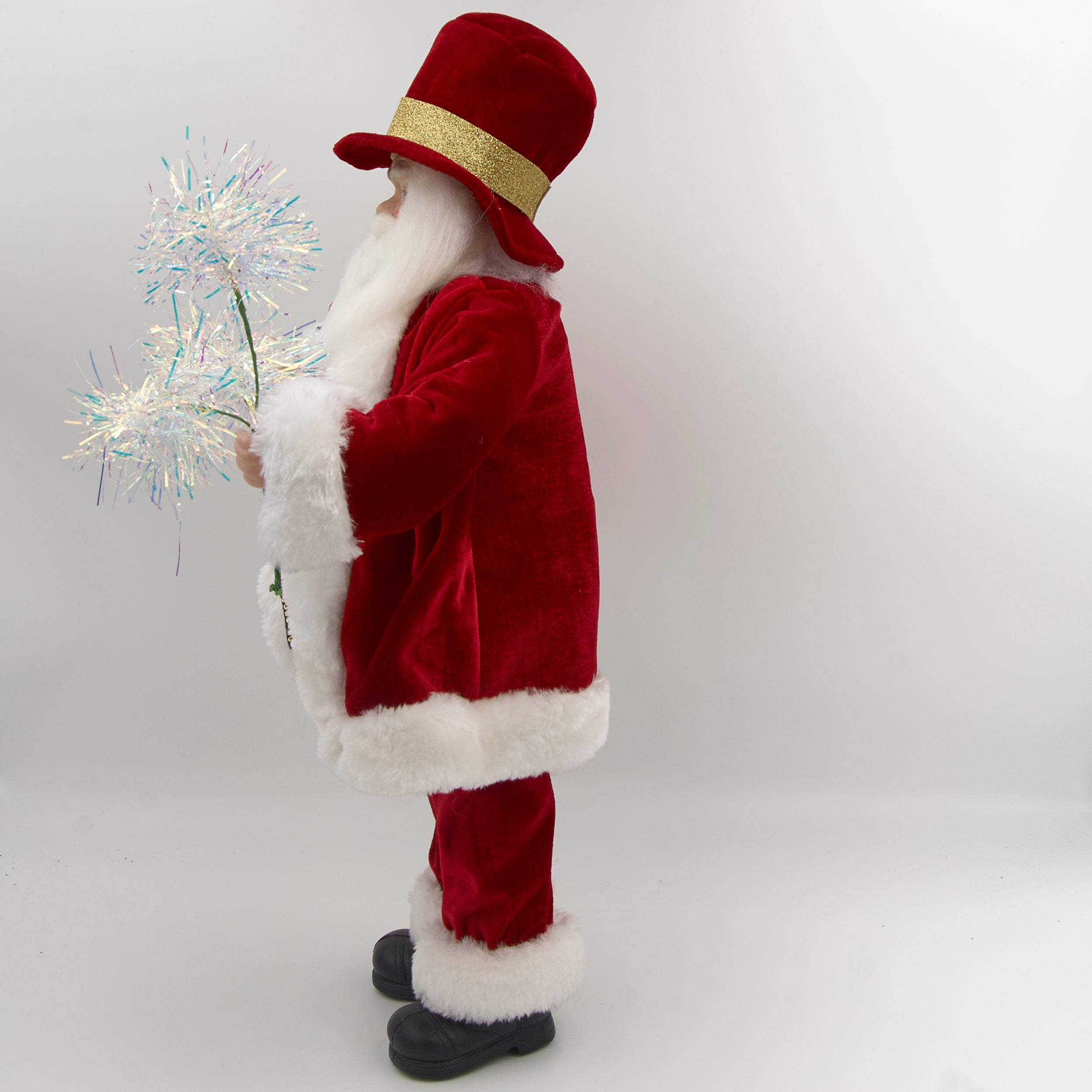 Traditional Santa Claus figure with American flag robe and sparklers on a white background