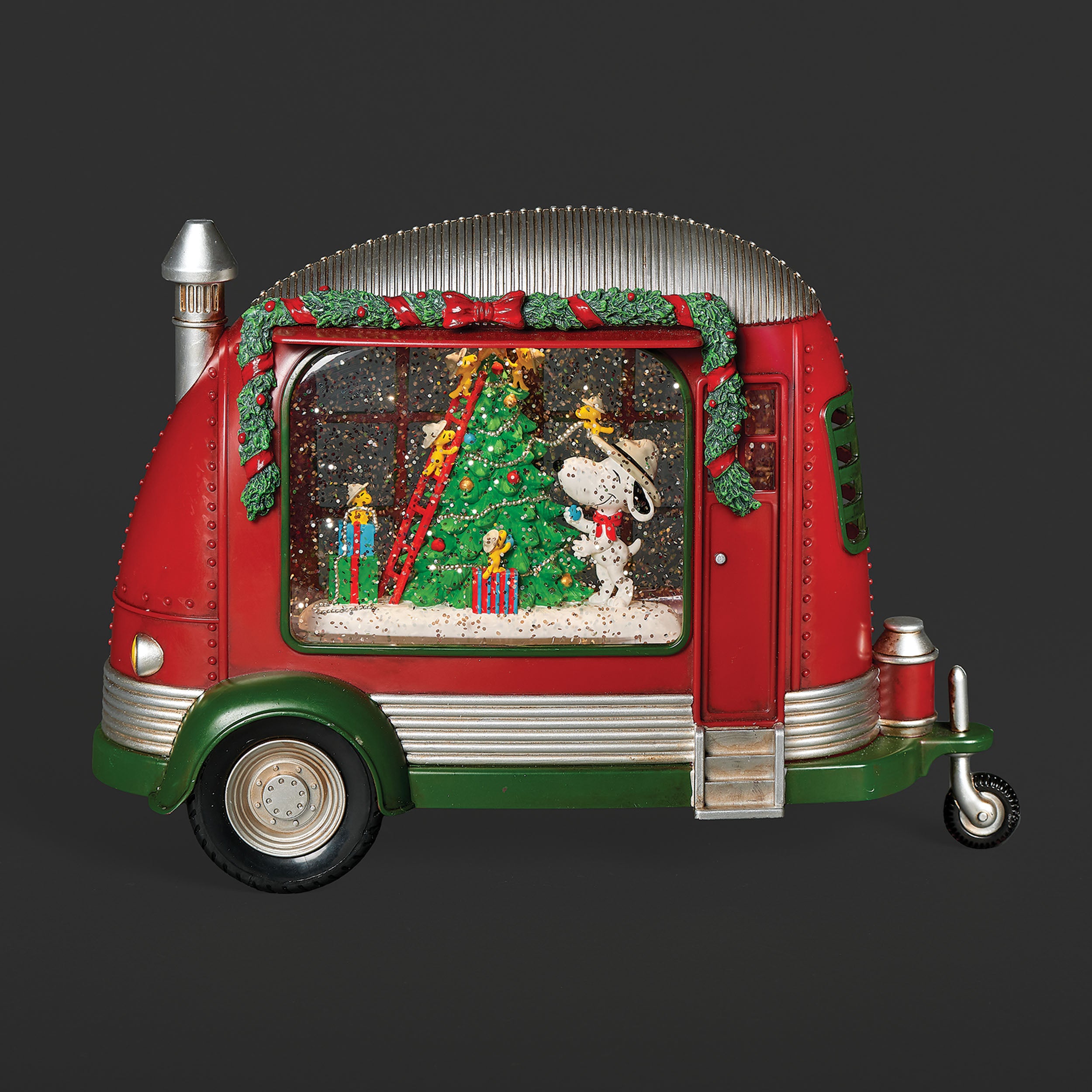 Decorative red and green camper with a tree, Snoopy, and yellow birds