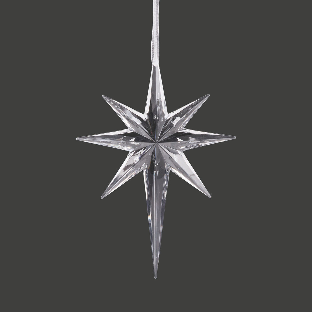 Star-shaped ornament on a black background