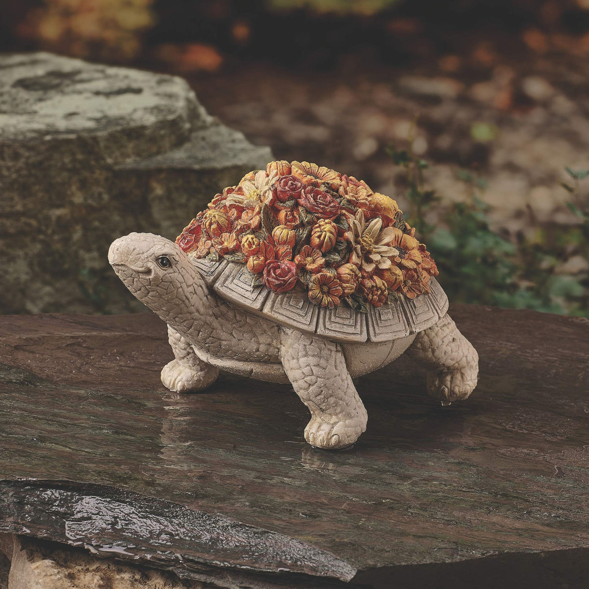 Turtle with Flower Shell garden statue displayed outdoors