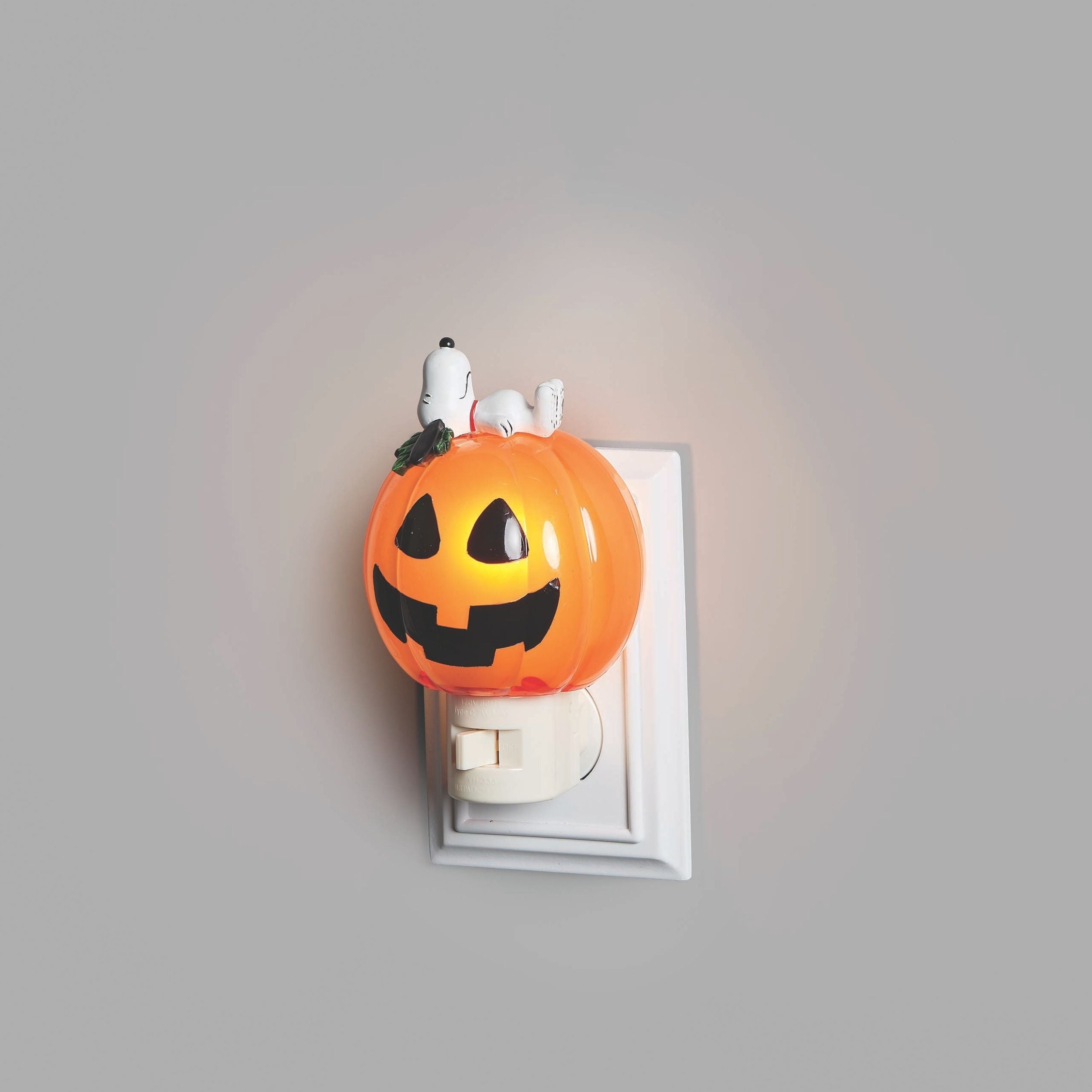 Halloween-themed night light with a jack-o'-lantern design on a gray background