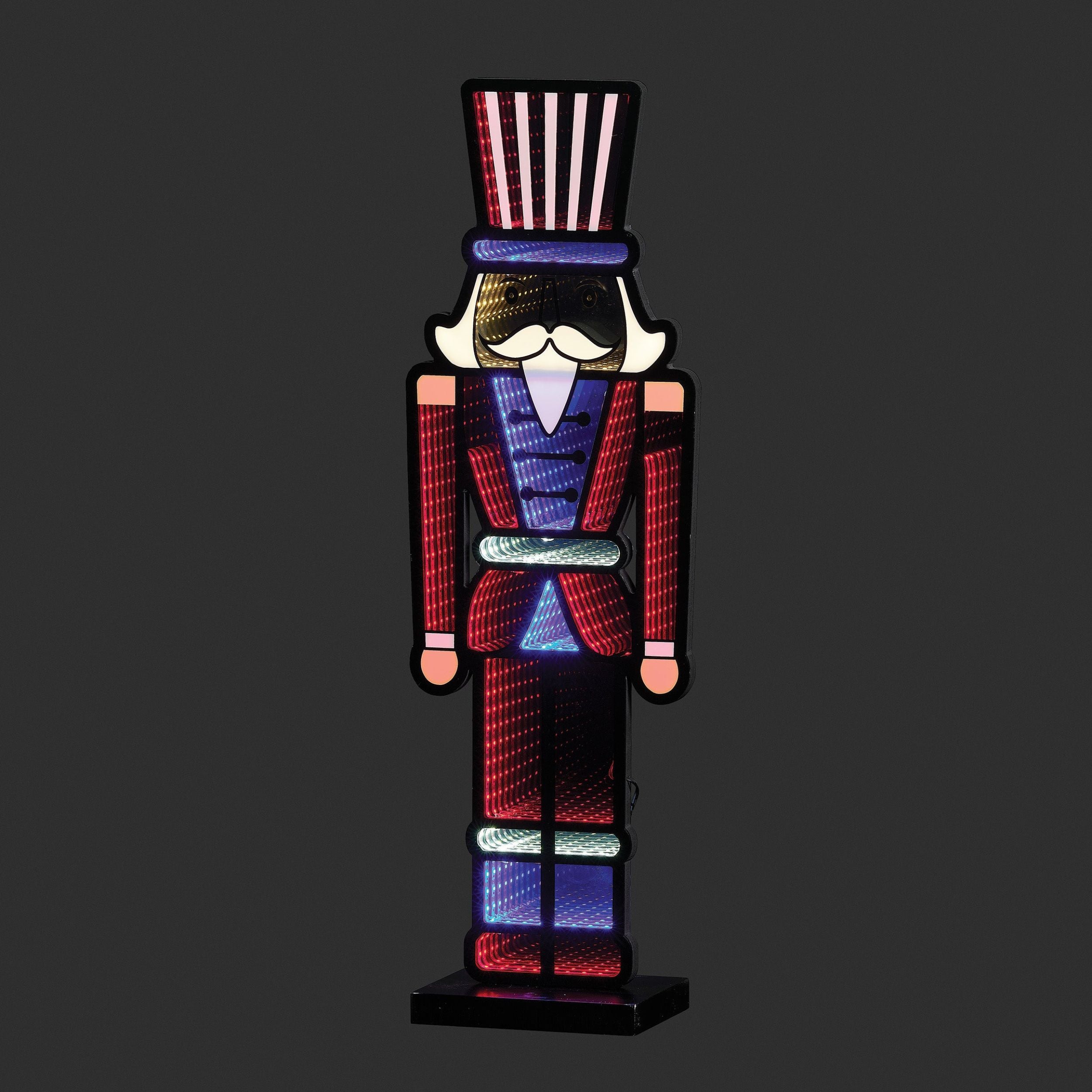 Decorative nutcracker figure with a patriotic design on a black background