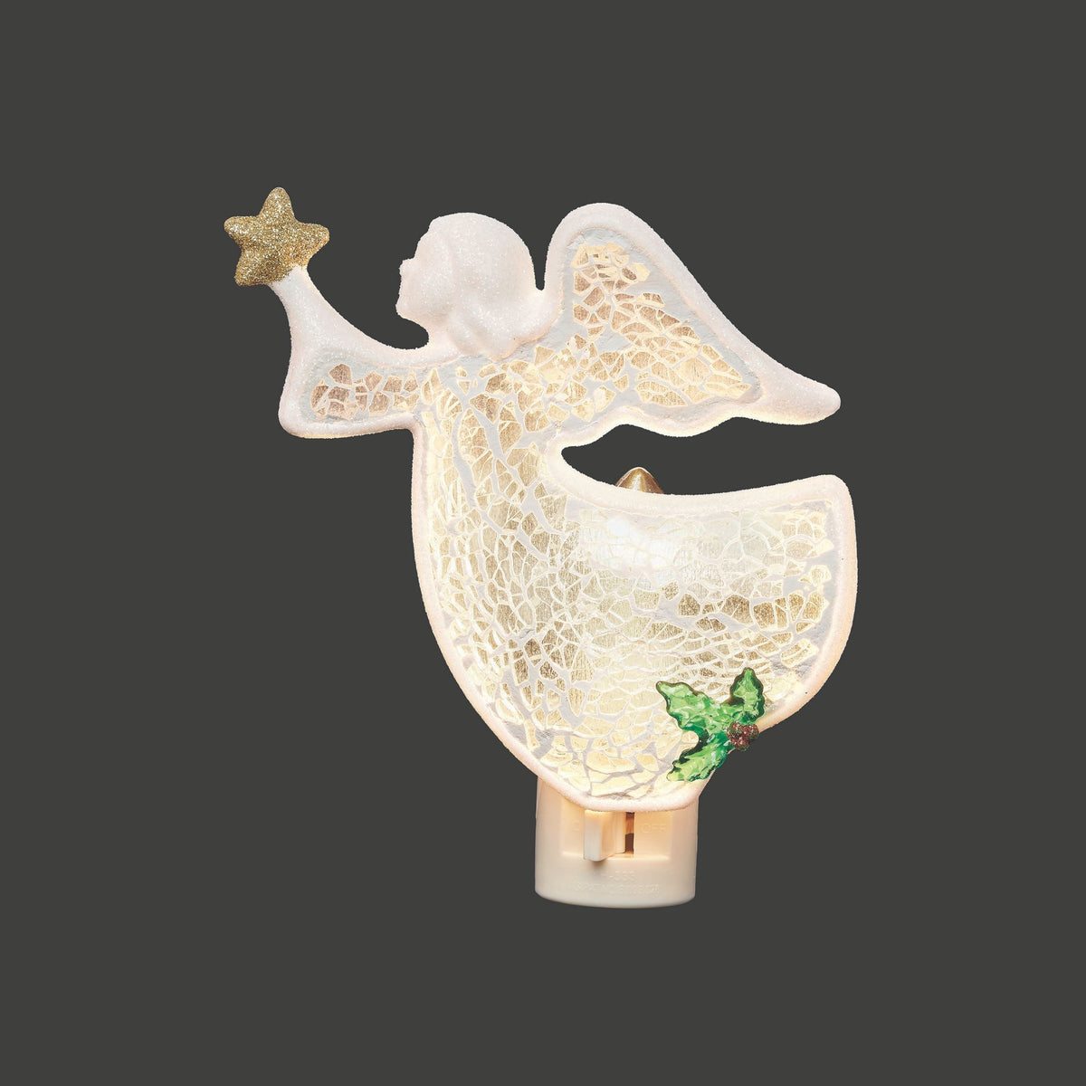 Decorative angel night light with a star on a dark background
