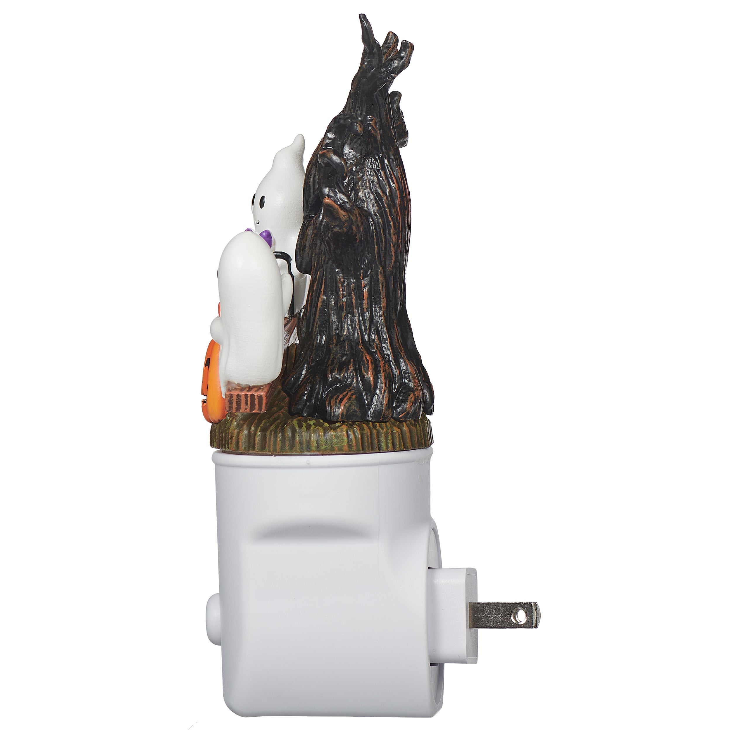 Decorative night light with witch and cat design on a white background