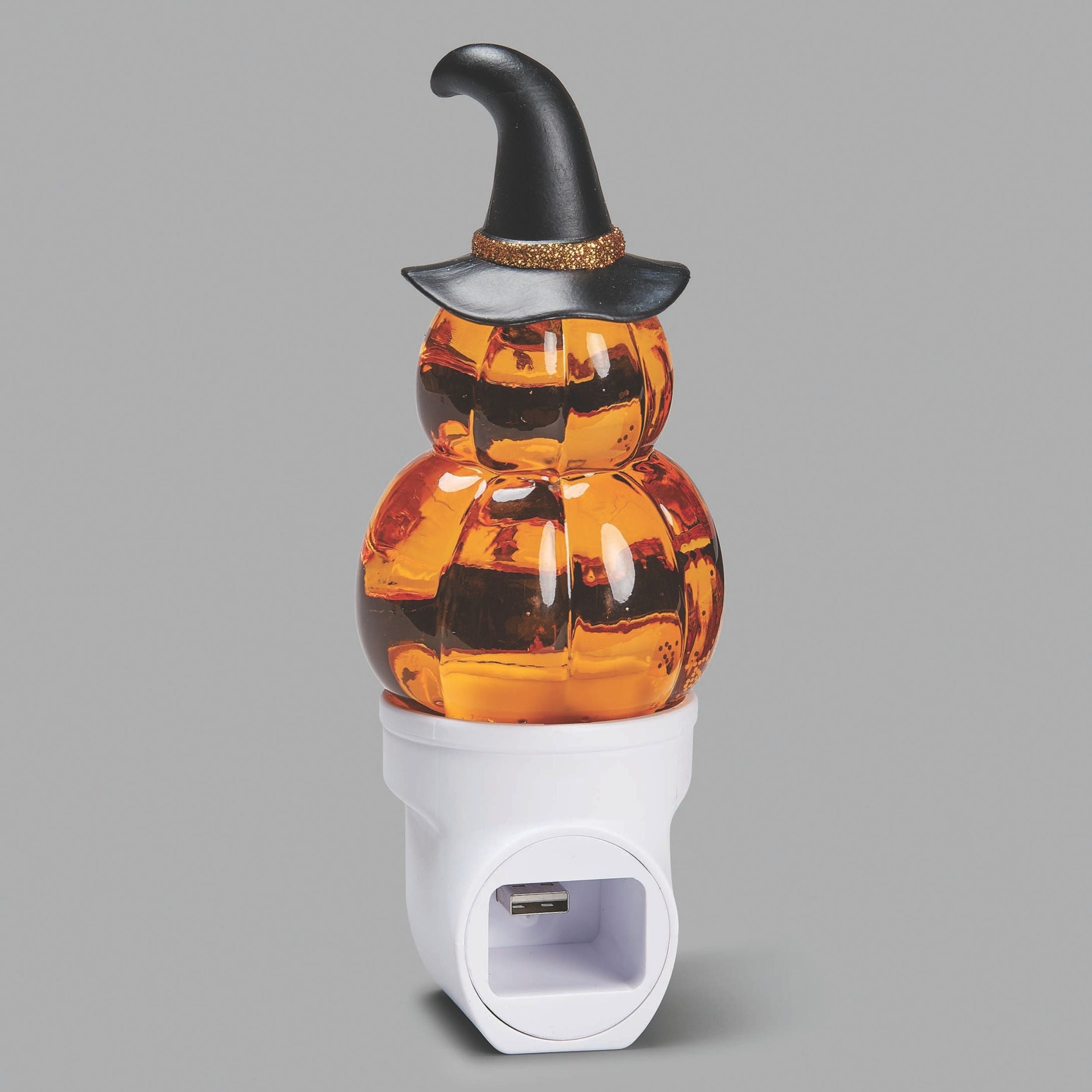 Halloween-themed night light with checkered design and witch hat on a gray background