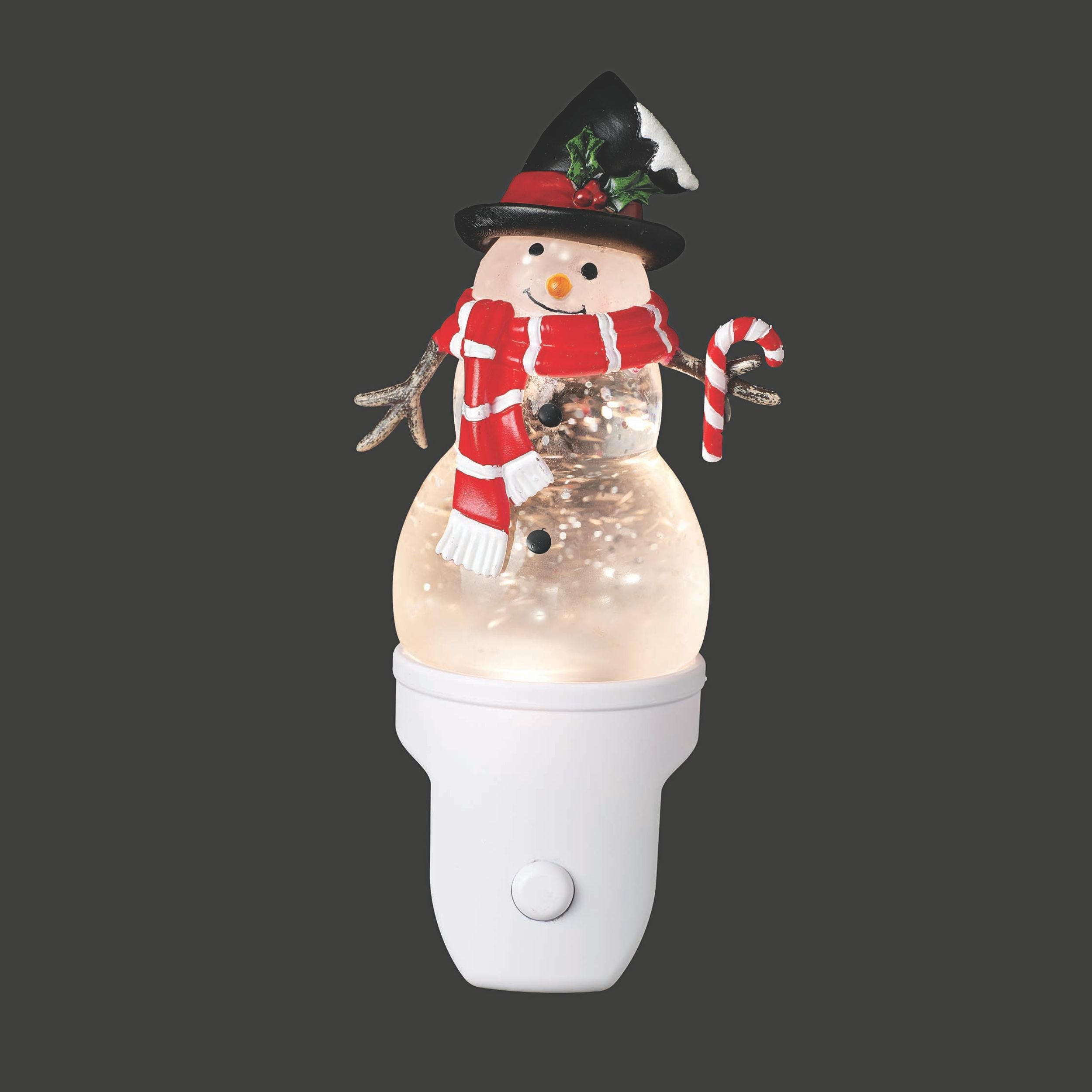 Decorative snowman night light with a dark background