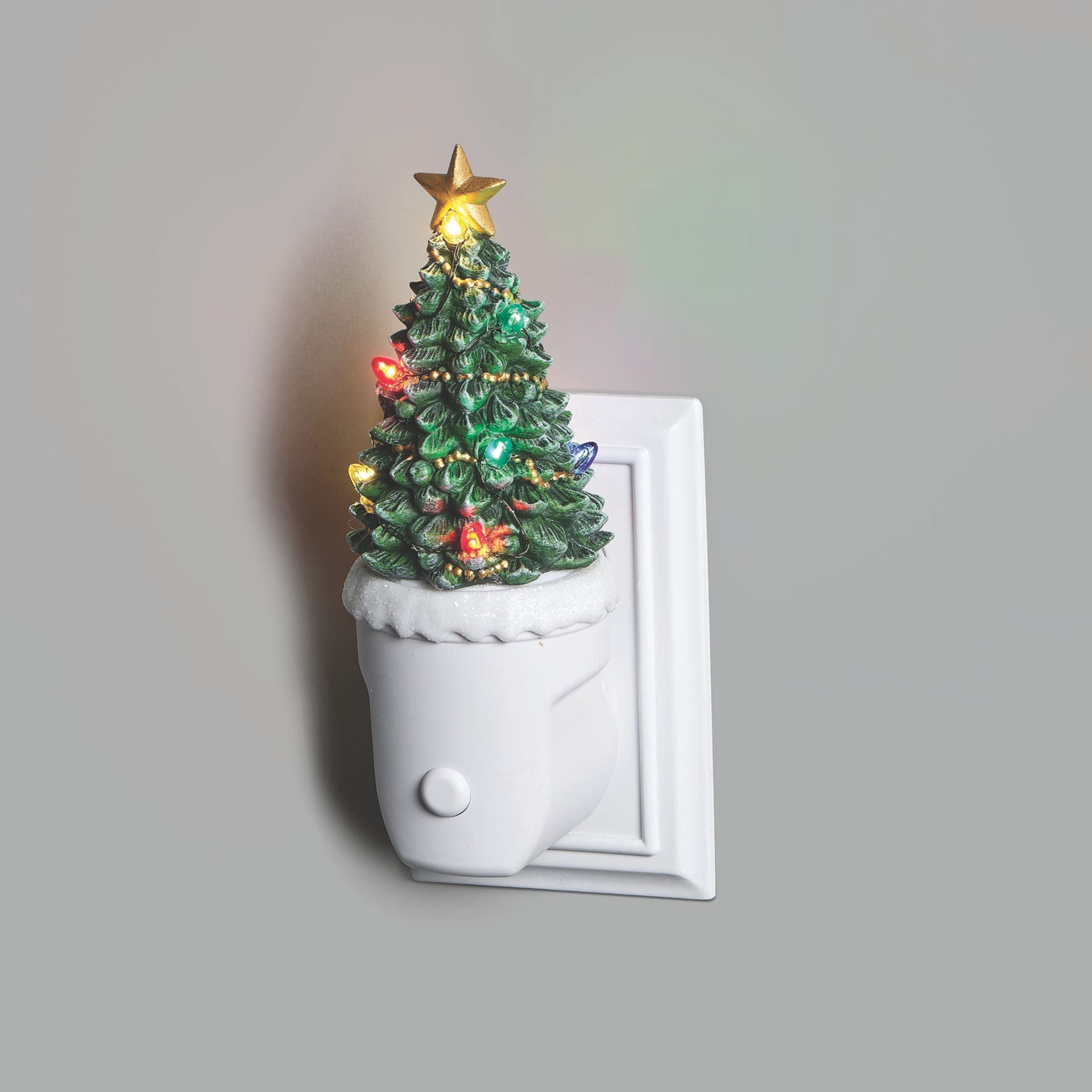 Decorative Christmas tree light fixture on a gray background