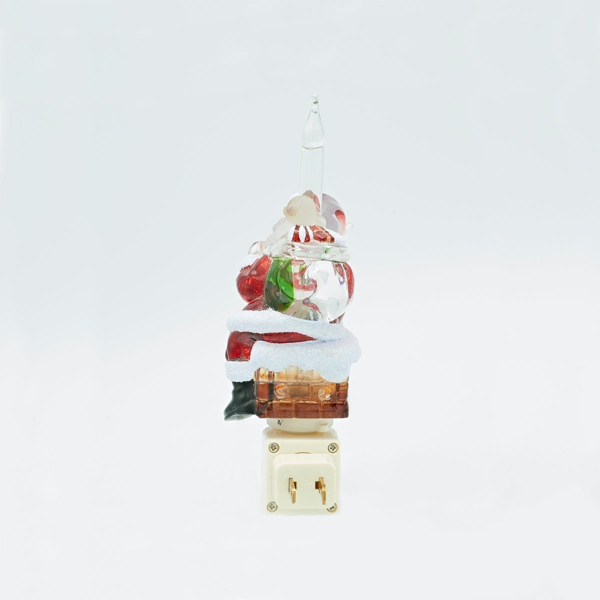 Front view of Santa in Chimney bubble night-light showing Santa’s red suit, snow-topped brick chimney, and white plug-in base.
