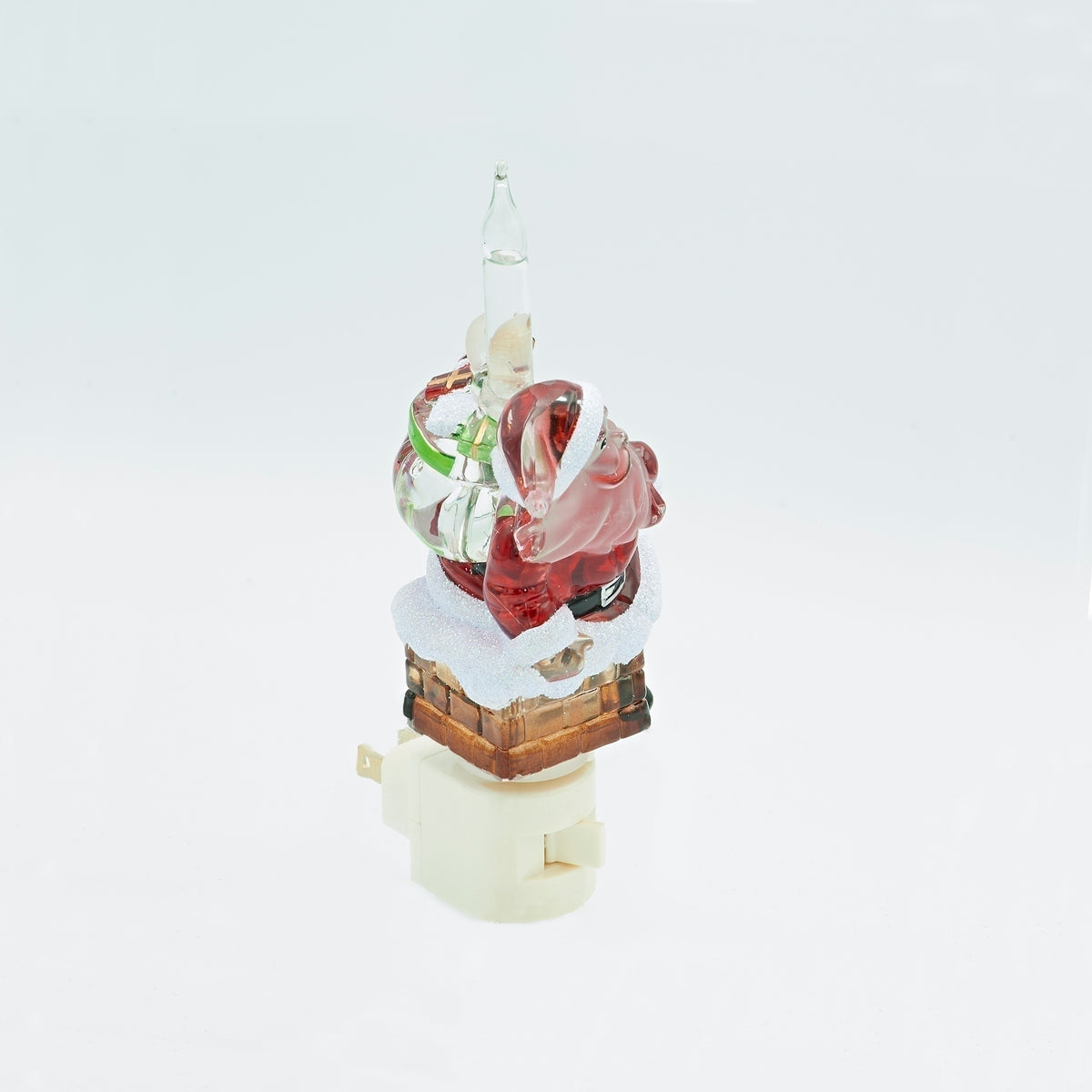 Angled view of Santa in Chimney bubble night-light showing Santa beside the clear bubble tube above a brick chimney and white base.