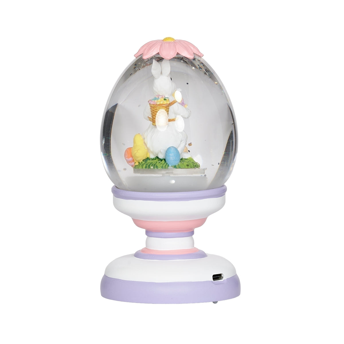Side view of lighted Easter egg dome with bunny scene and pastel pedestal