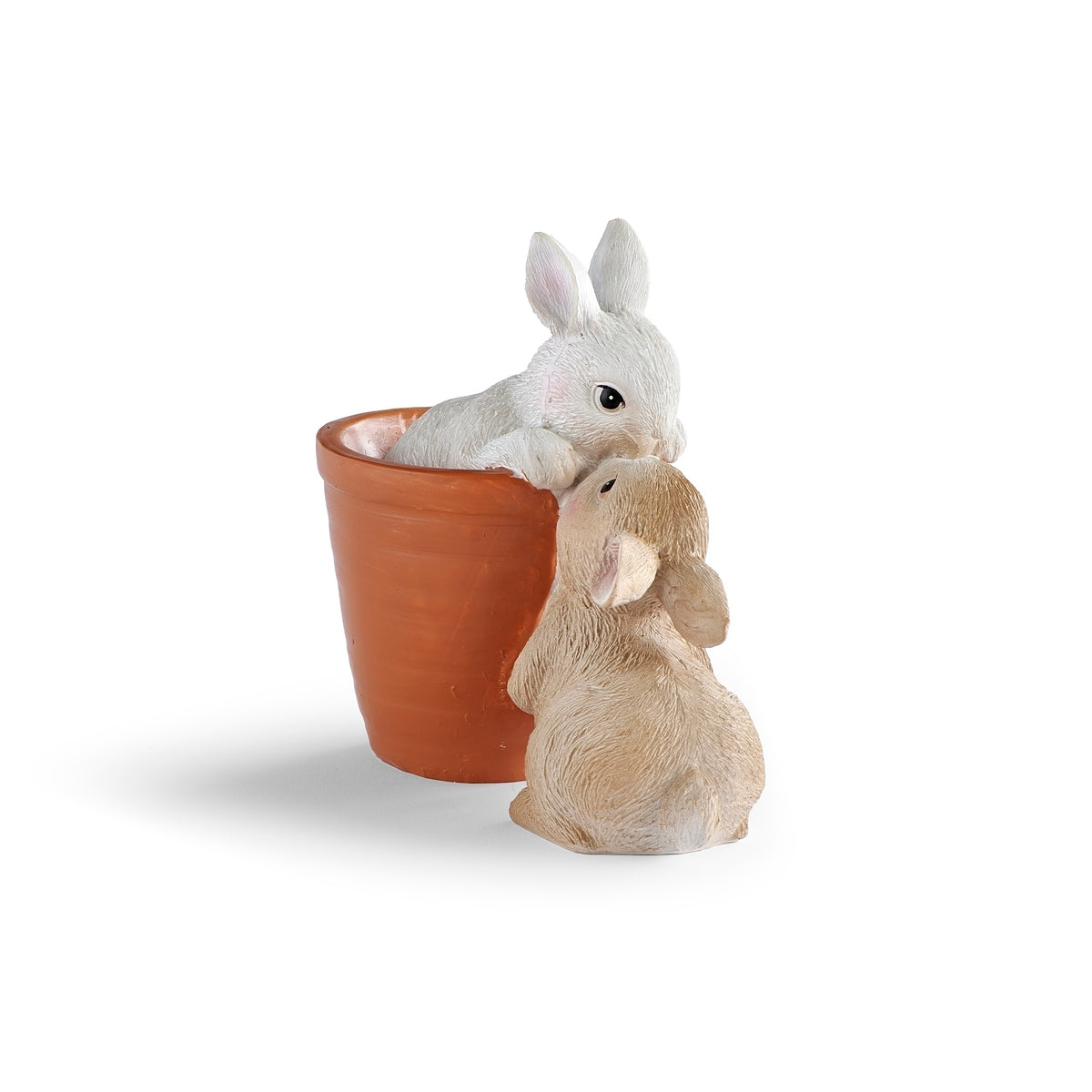 Side view of two Easter bunnies beside terracotta flowerpot