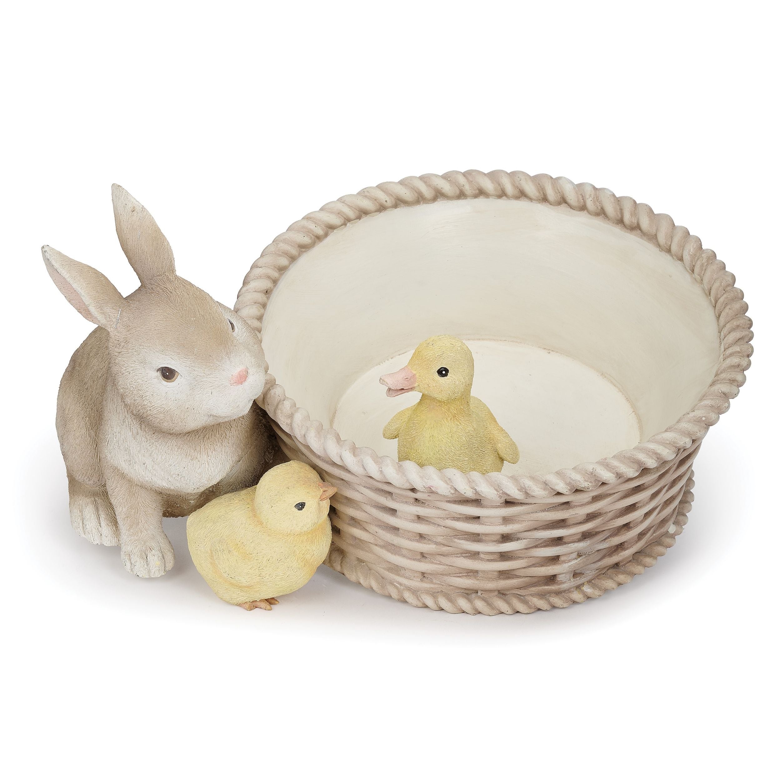 Toy rabbit and ducklings with a basket on a white background