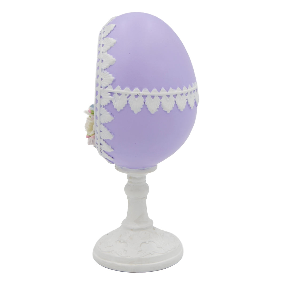 Side view of purple Easter sugar egg decoration with floral trim on pedestal