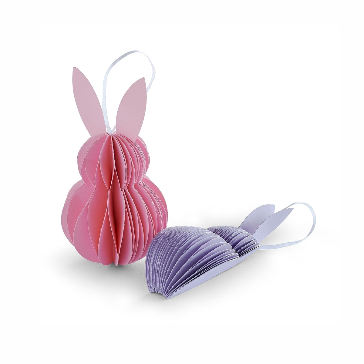 Pink and purple honeycomb Easter bunny ornaments shown from multiple angles