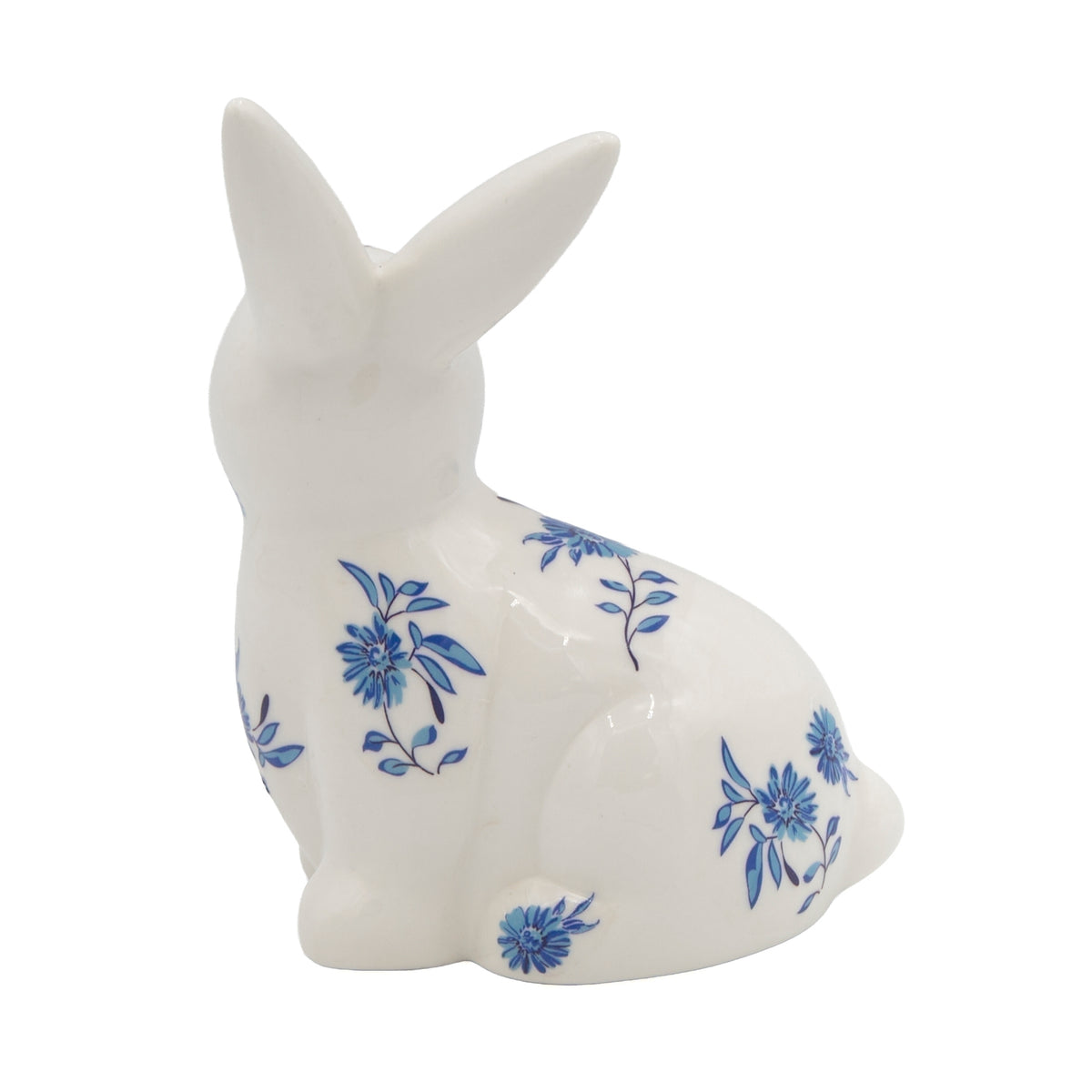 Sitting Blue Willow Bunny porcelain figure with blue floral design, side view