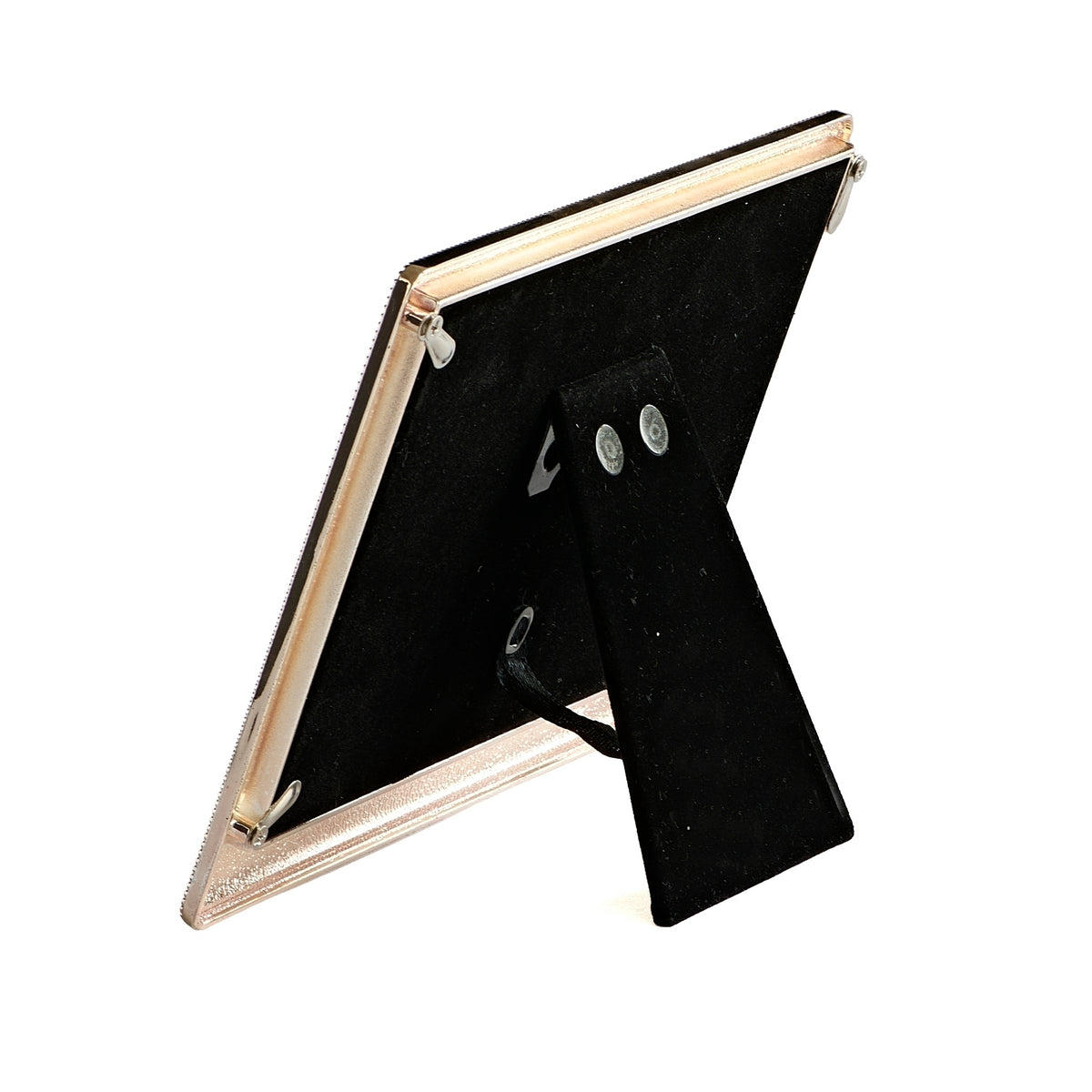 Rear angled view of Caroline Collection "It's a Girl" Keepsake Picture Frame showing the pink frame edge, black backing, and fold-out tabletop easel stand