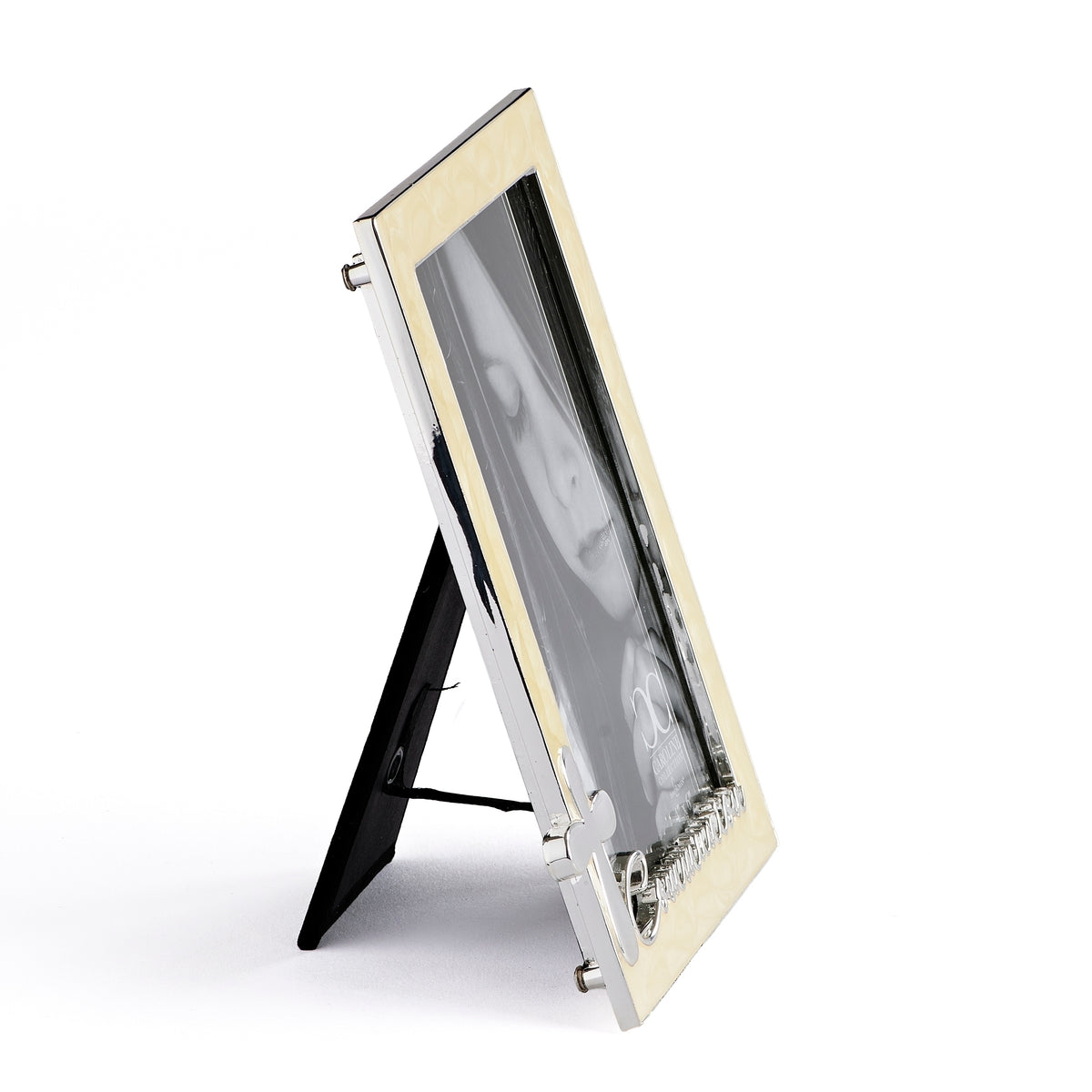Opposite side view of Caroline Collection First Communion picture frame showing the frame depth, ivory finish, and tabletop stand