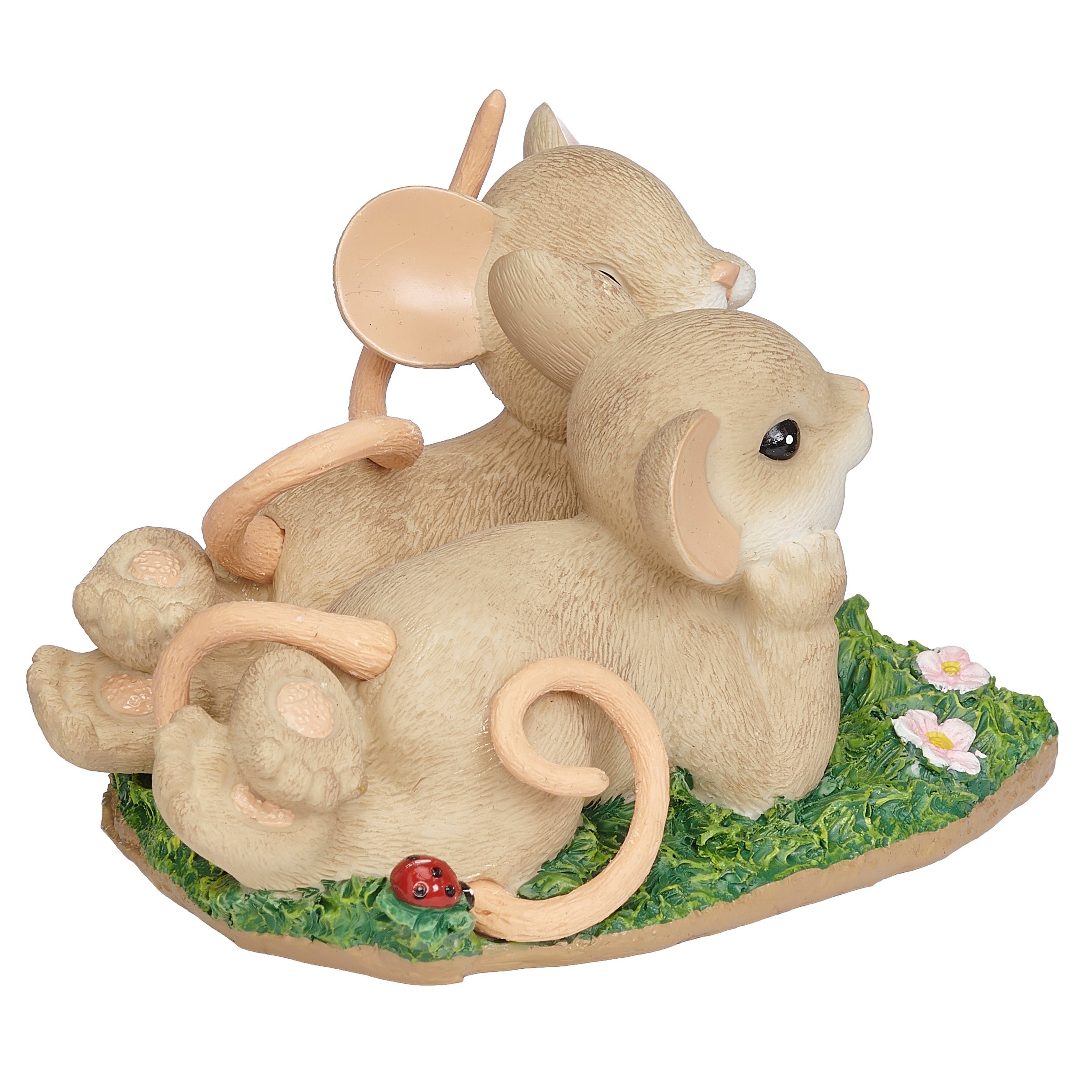Decorative figurine of two mice on a base with grass and flowers