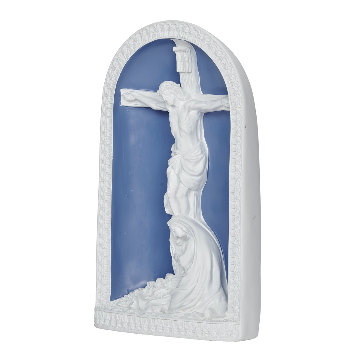 Front angled view of Mary Weeps at Crucifix showing the white sculpted crucifix and kneeling Mary within the blue arched frame