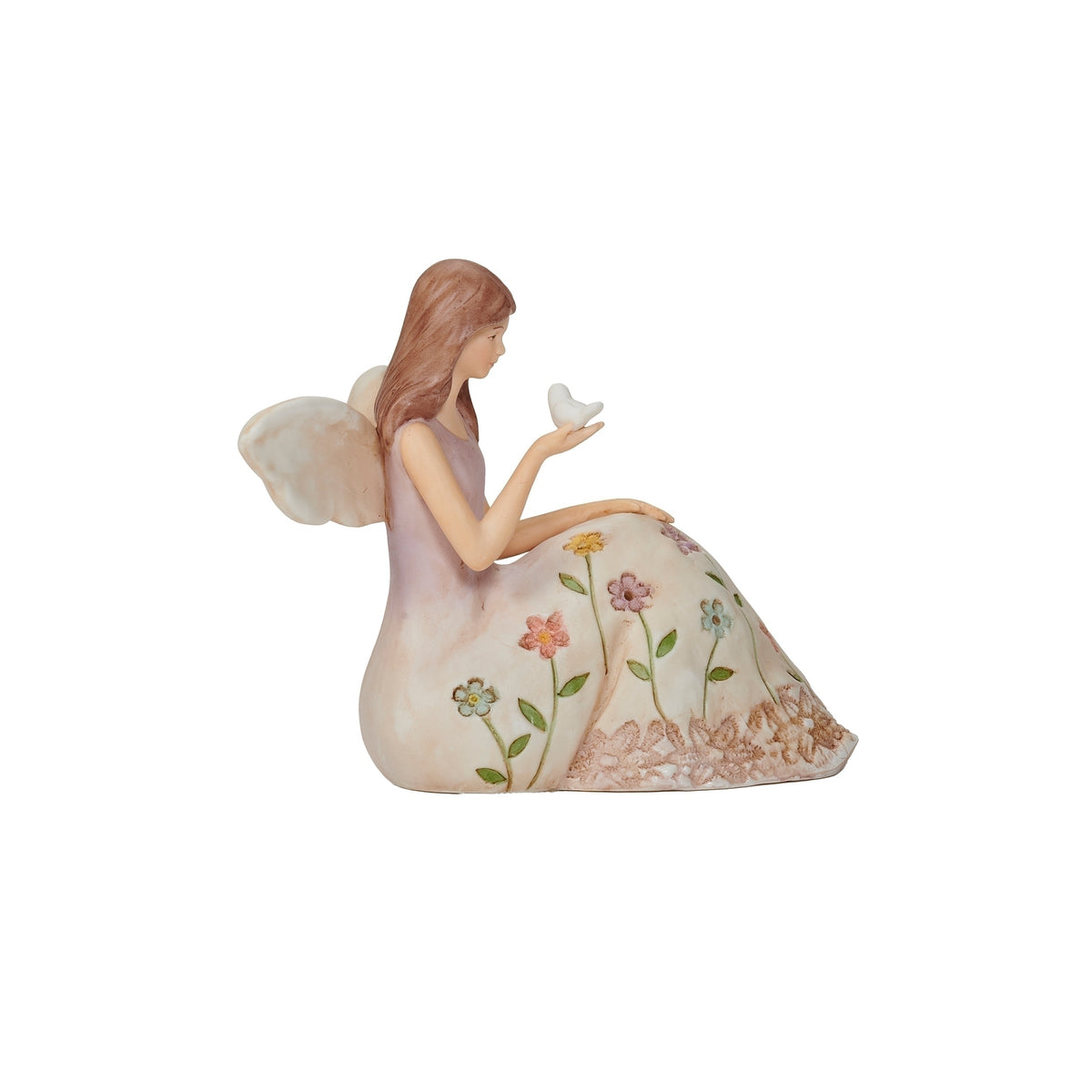 Rear angled view of Seated Angel with Bird figure showing the floral design and white wings