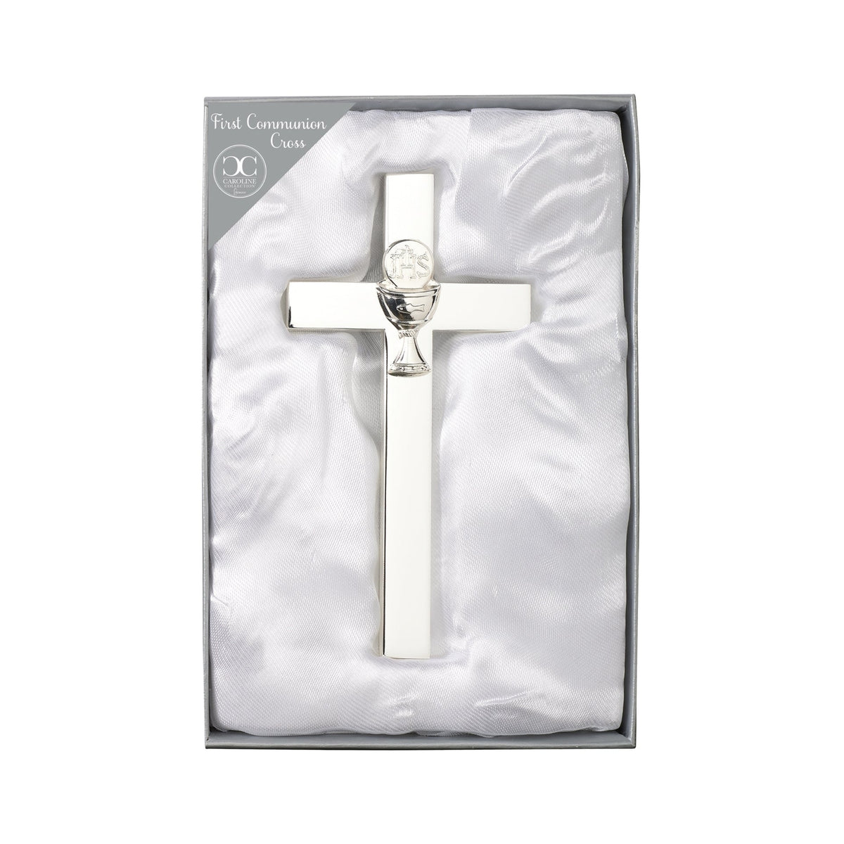 Caroline Collection First Communion Wall Cross displayed in presentation packaging with the polished silver-tone cross and raised chalice emblem visible