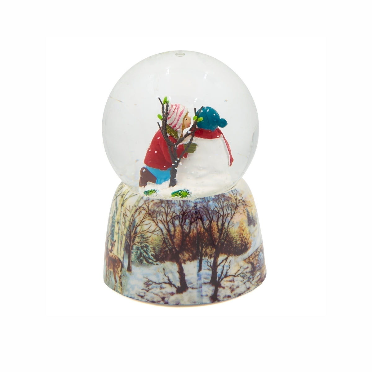 Rear view of A Kiss for Frosty snow globe showing the girl’s red coat, the snowman, and snow-covered trees and houses around the base.