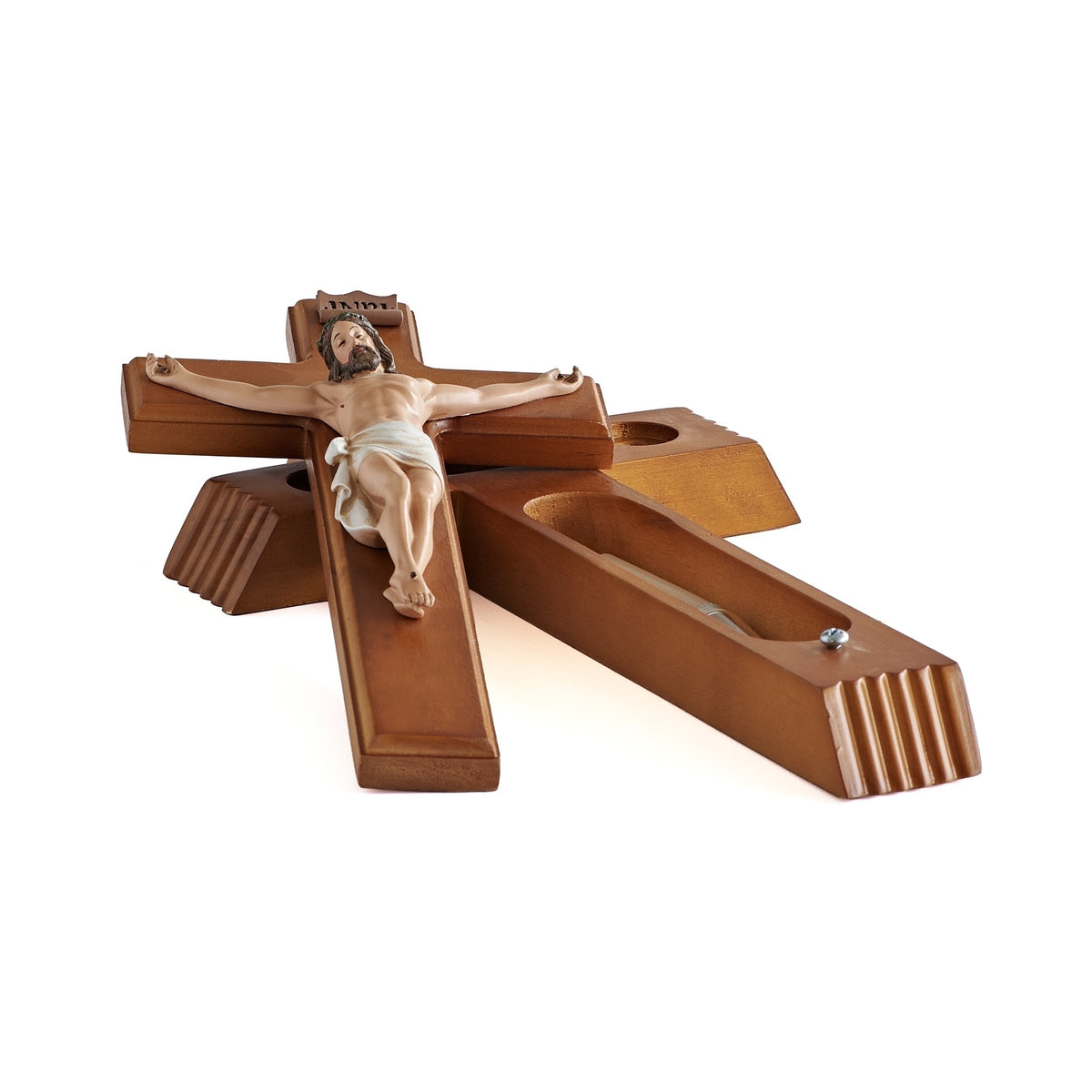 Open wooden sick call crucifix with devotional candles and holy water bottle storage