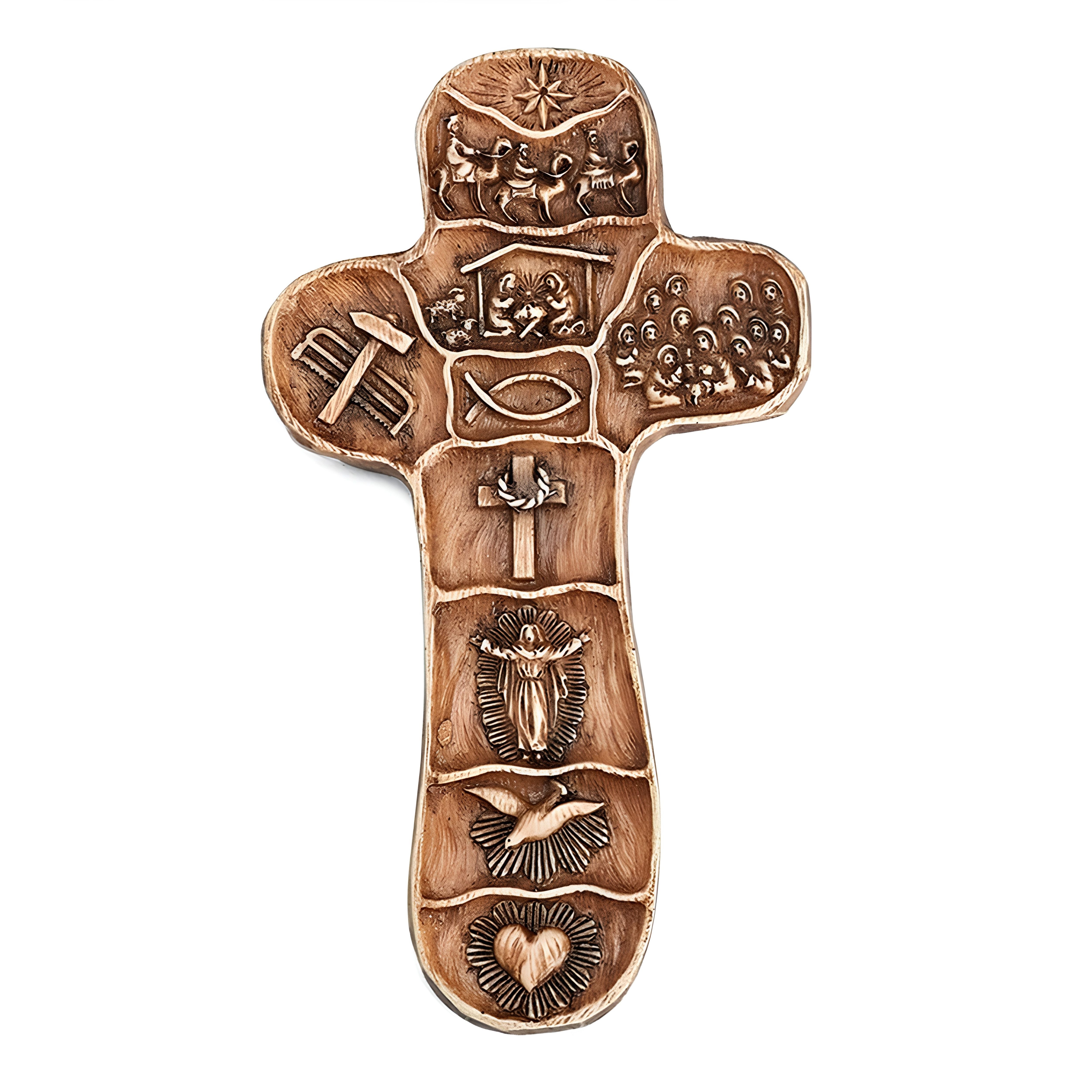 Decorative wooden cross with engraved symbols on a white background
