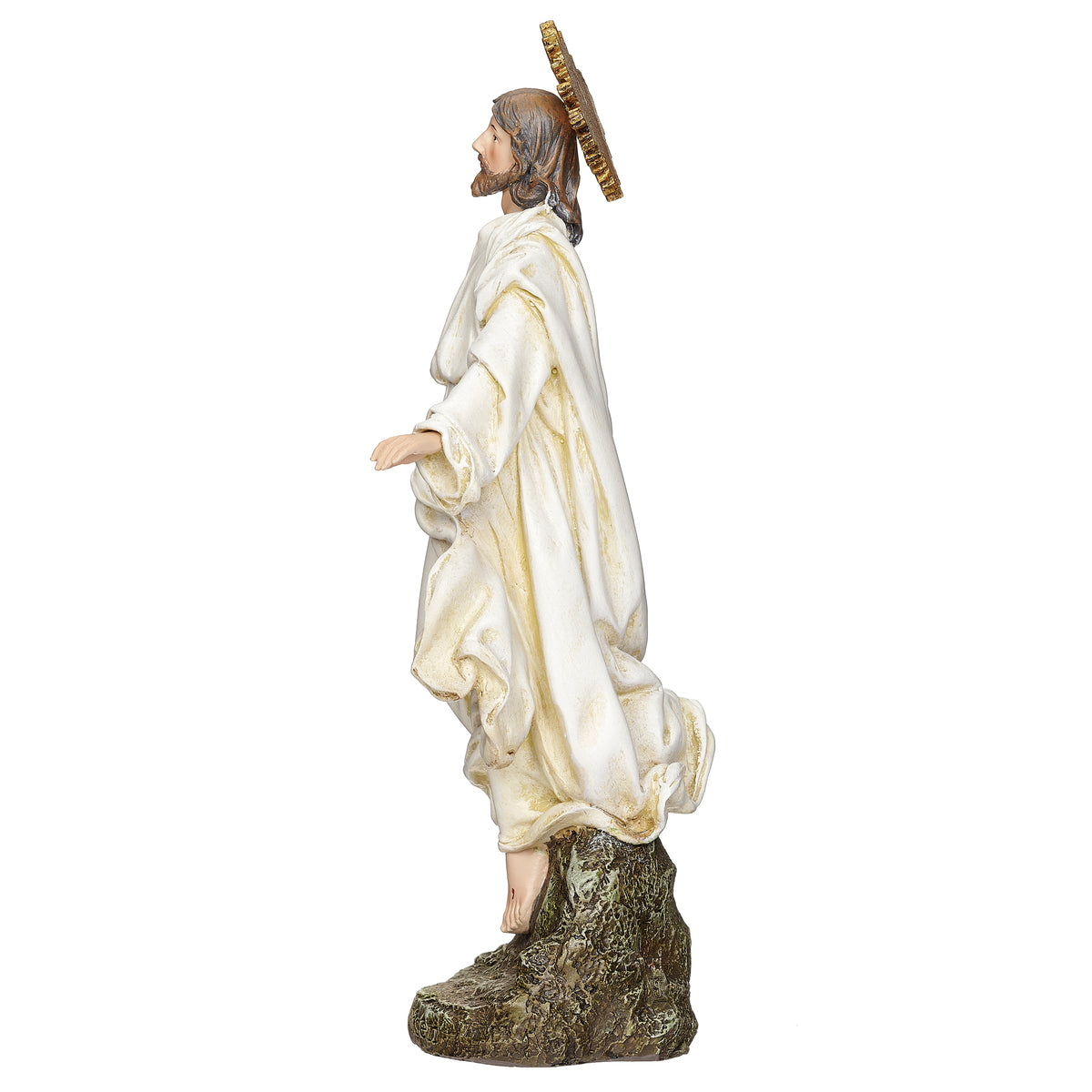 Side view of Joseph's Studio Christ Is Risen Figure showing the flowing white robe, extended arm, radiant halo, and rocky pedestal