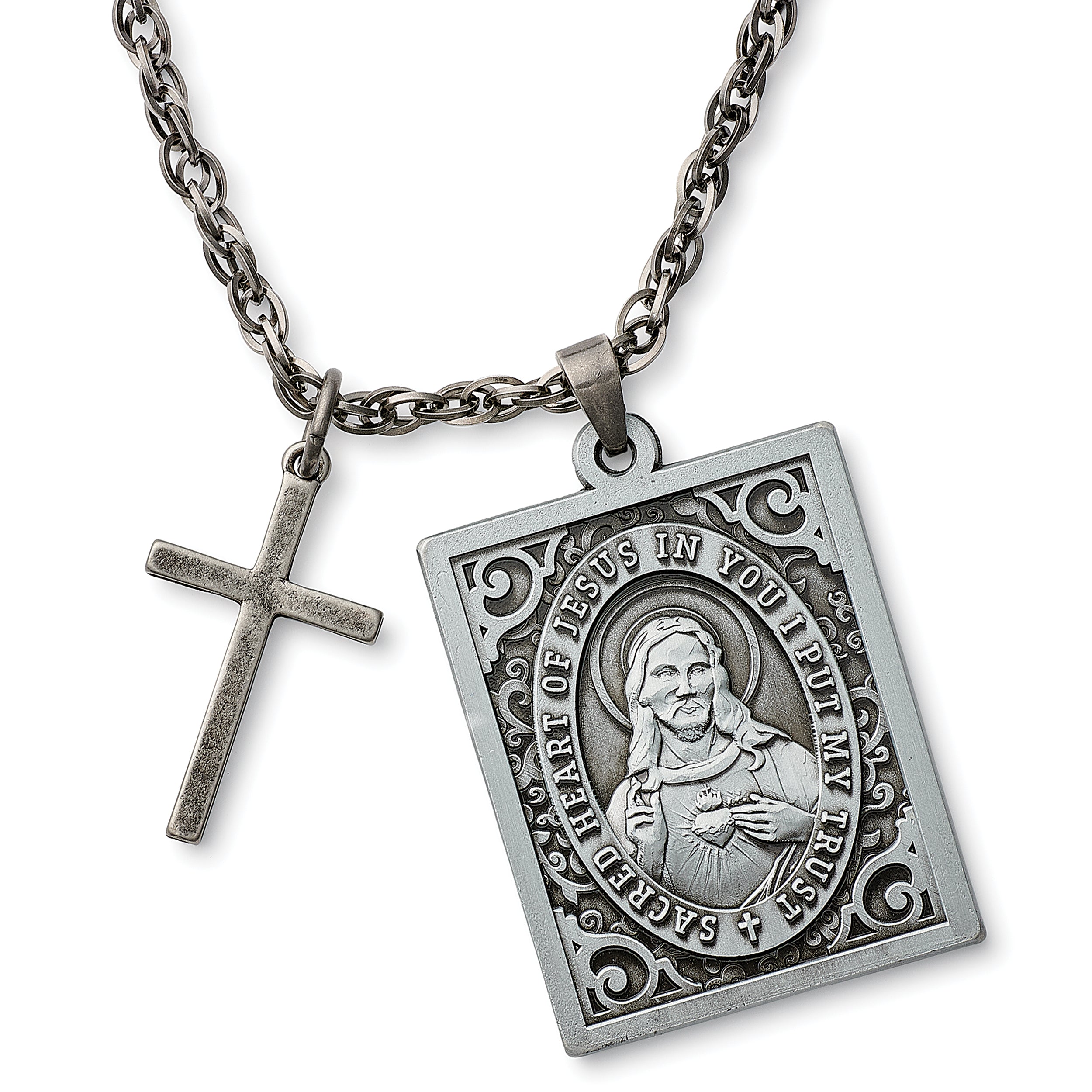 Silver religious chain with a pendant and cross on a white background