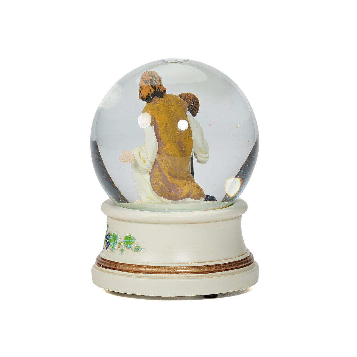 Rear angled view of First Communion musical glitterdome showing Jesus and the boy from behind inside the glass globe