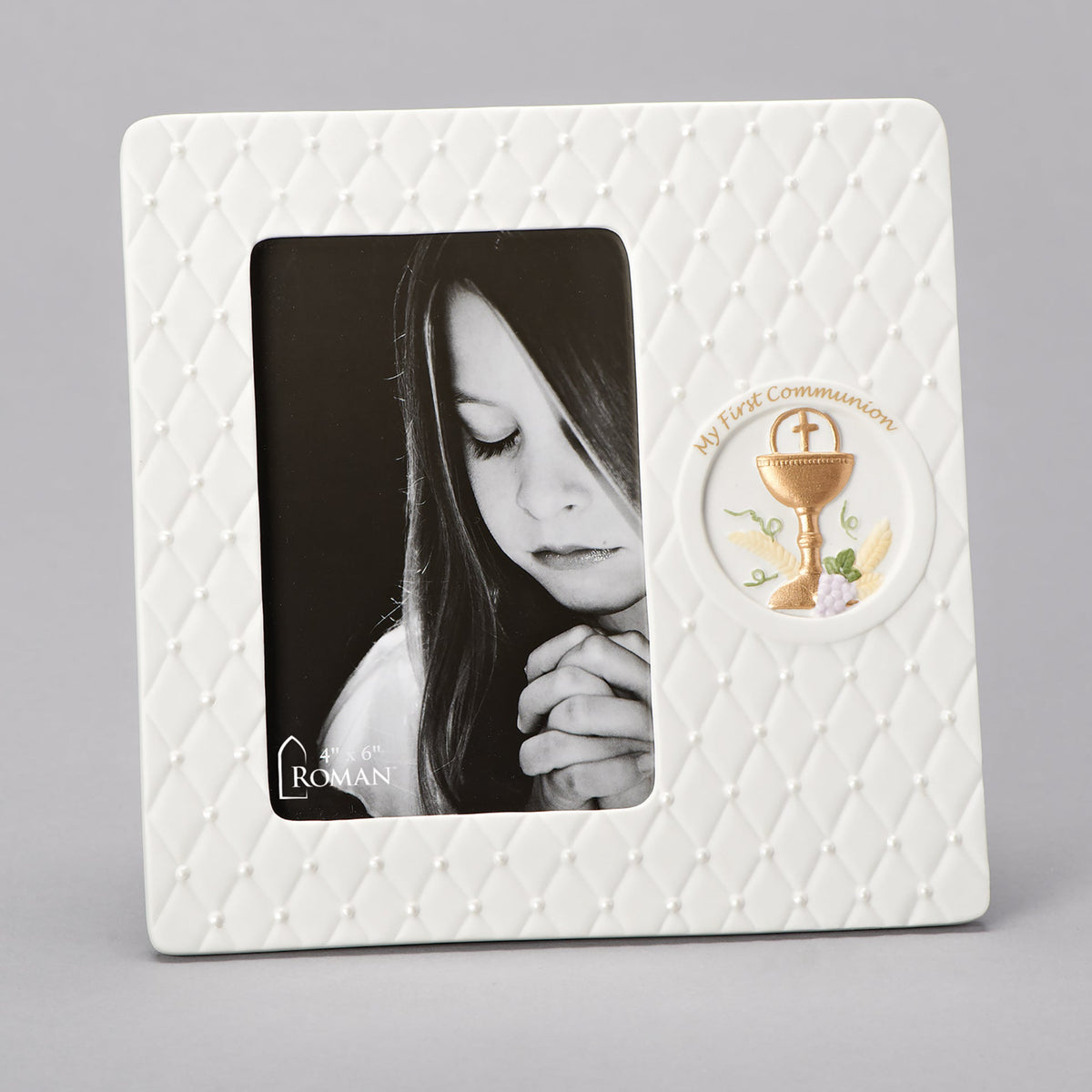 My First Communion picture frame featuring a white quilted porcelain design, gold chalice emblem with wheat and grapes, and space for a 4 x 6 photo