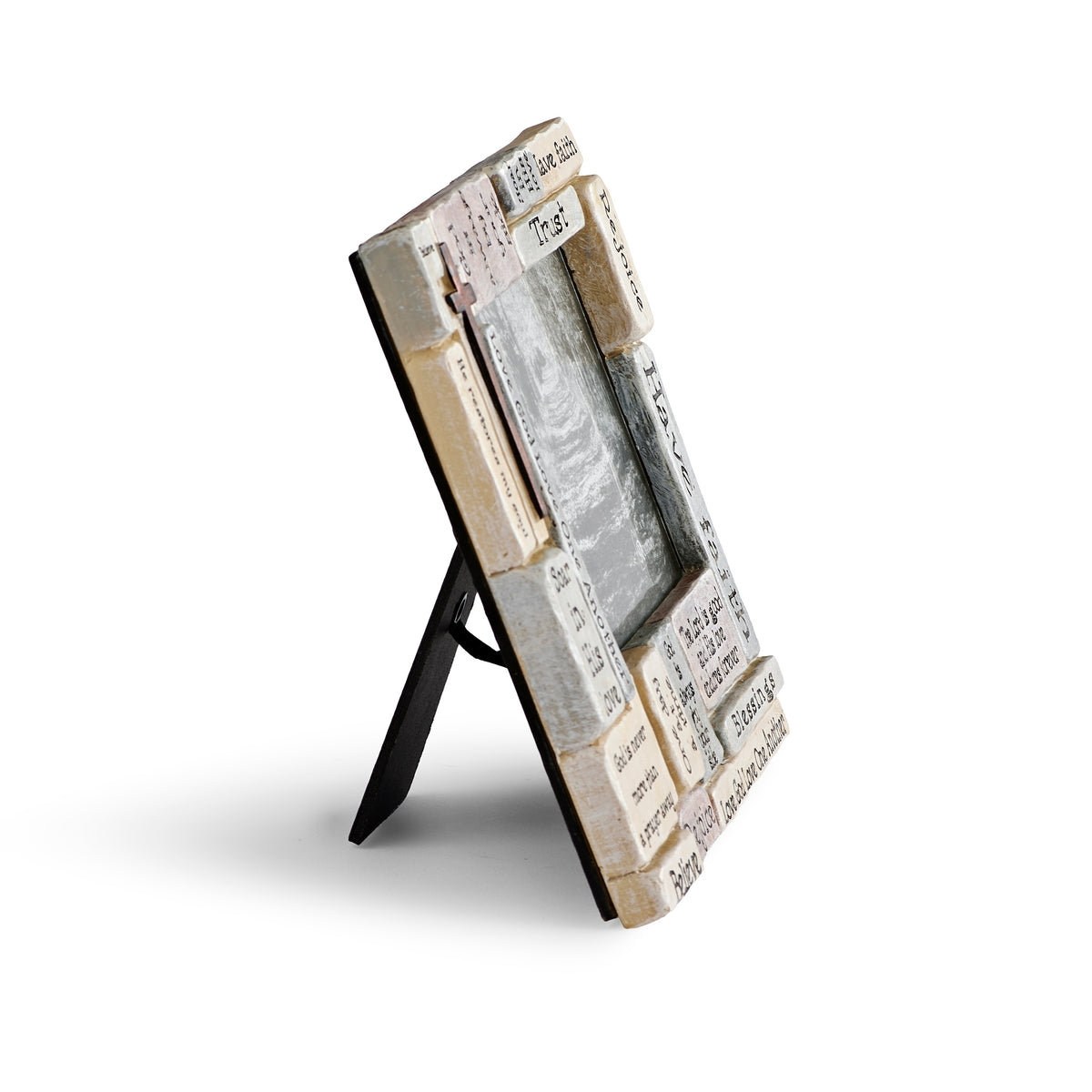 Angled front view of crossword frame showing its raised word blocks and freestanding easel support.