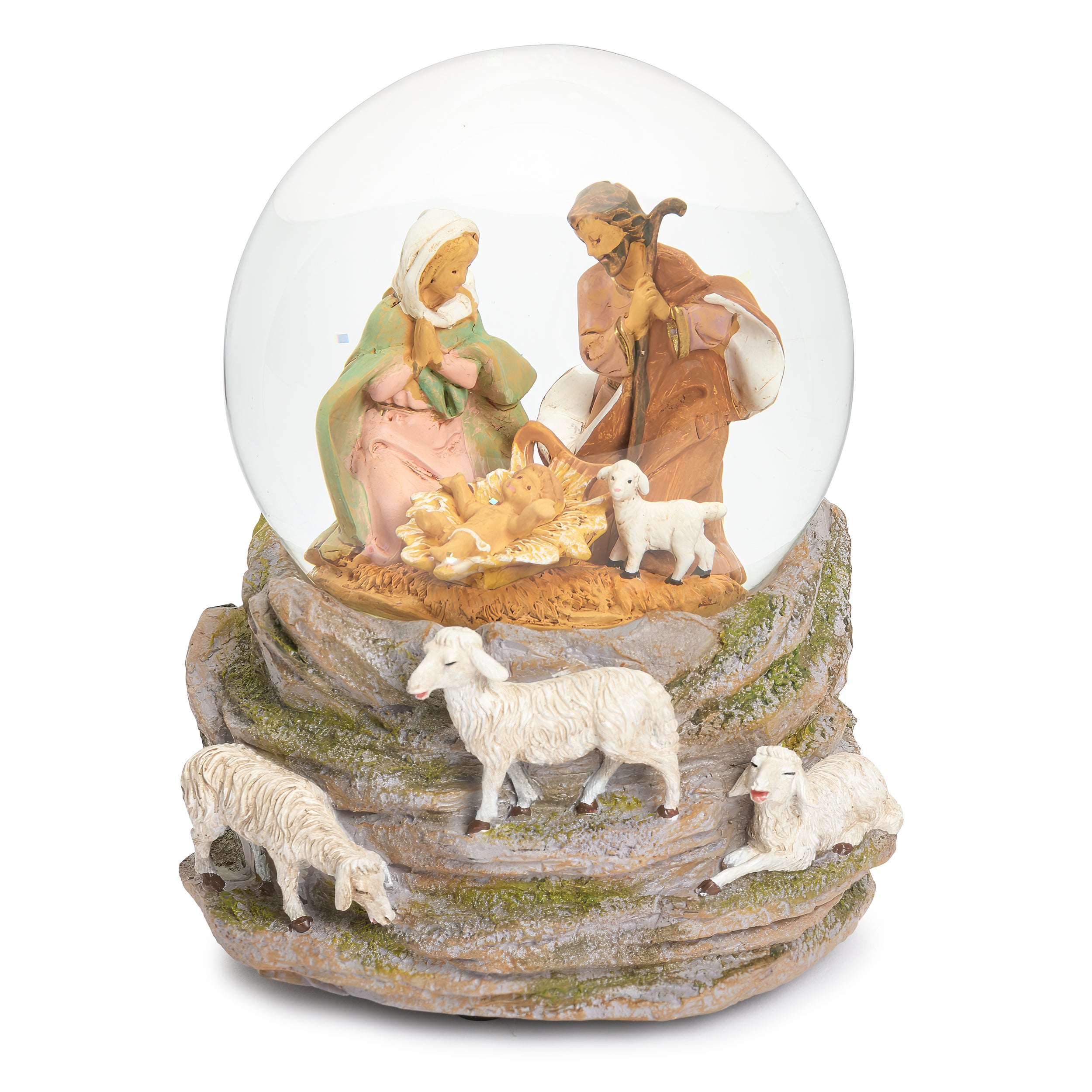 A nativity scene snow globe figurine featuring Mary, Joseph, baby Jesus in a manger, and several white sheep on a textured stone base, photographed against a plain white background.